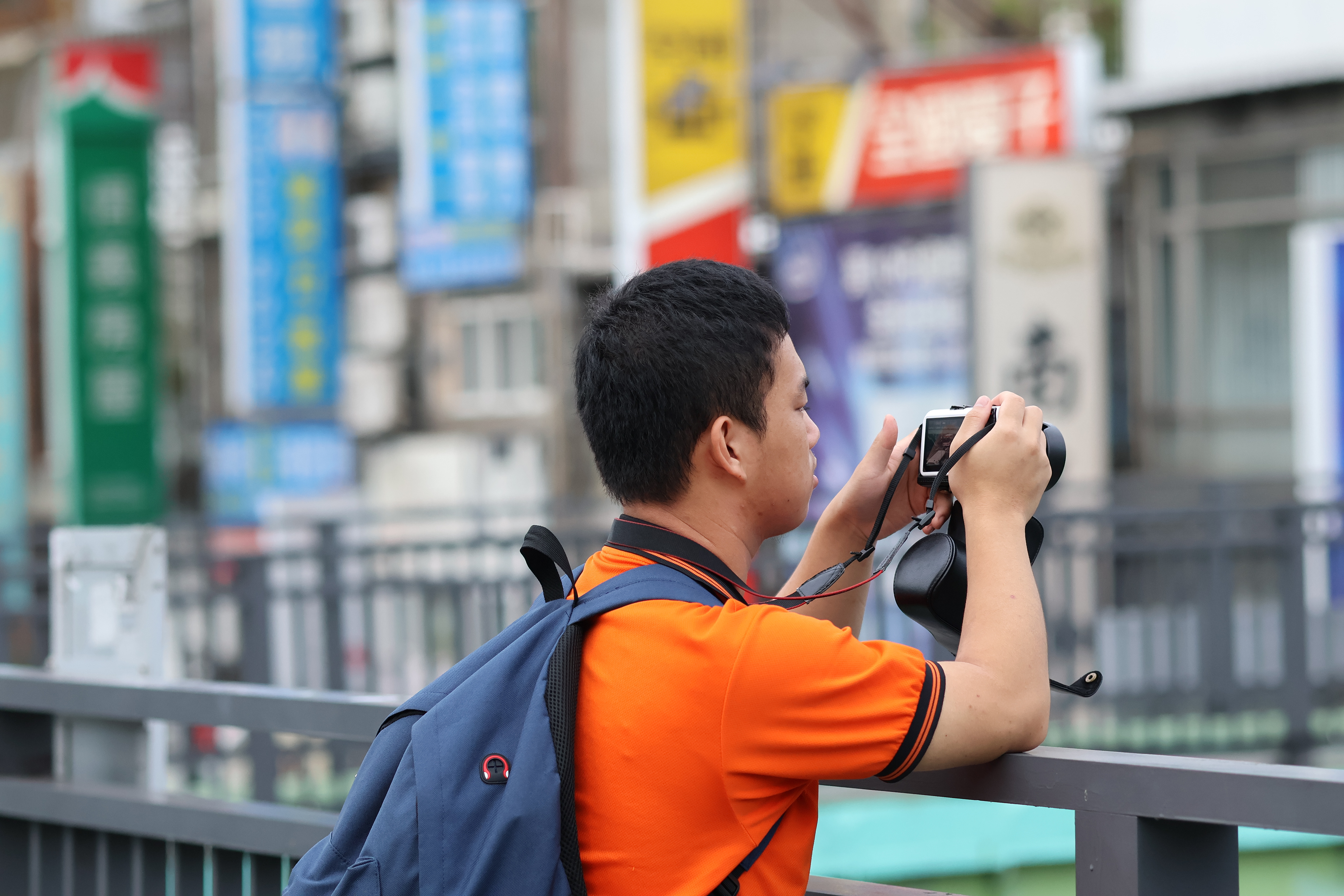 A photographer takes in the scene.