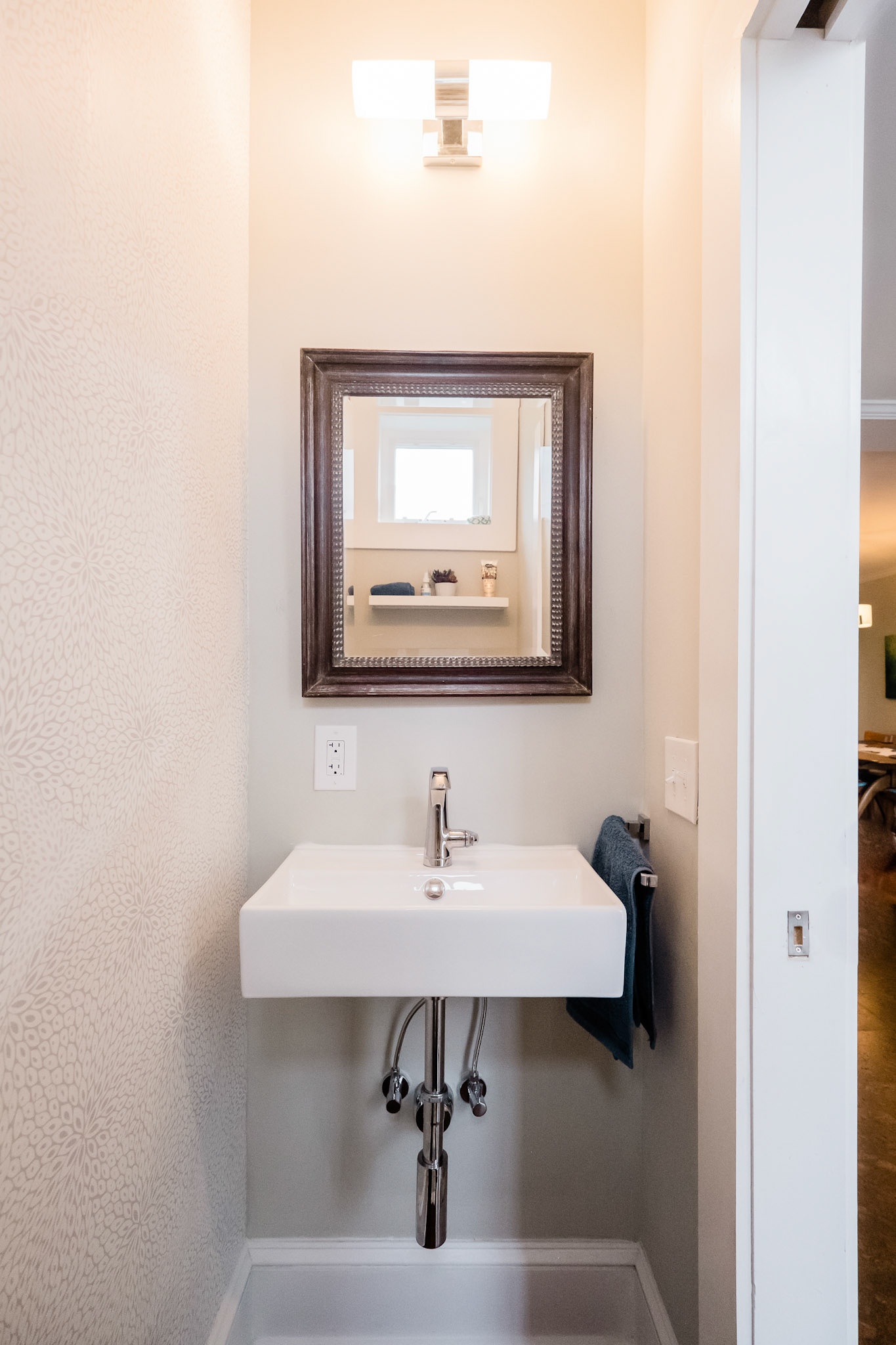 A cute half bath was incorporated as well.