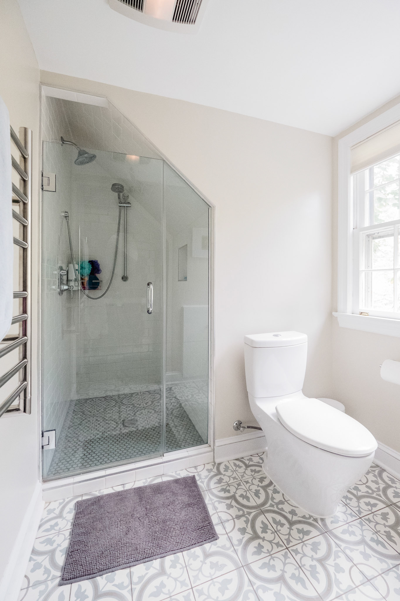 The new shower was tucked gracefully under the existing roofline.