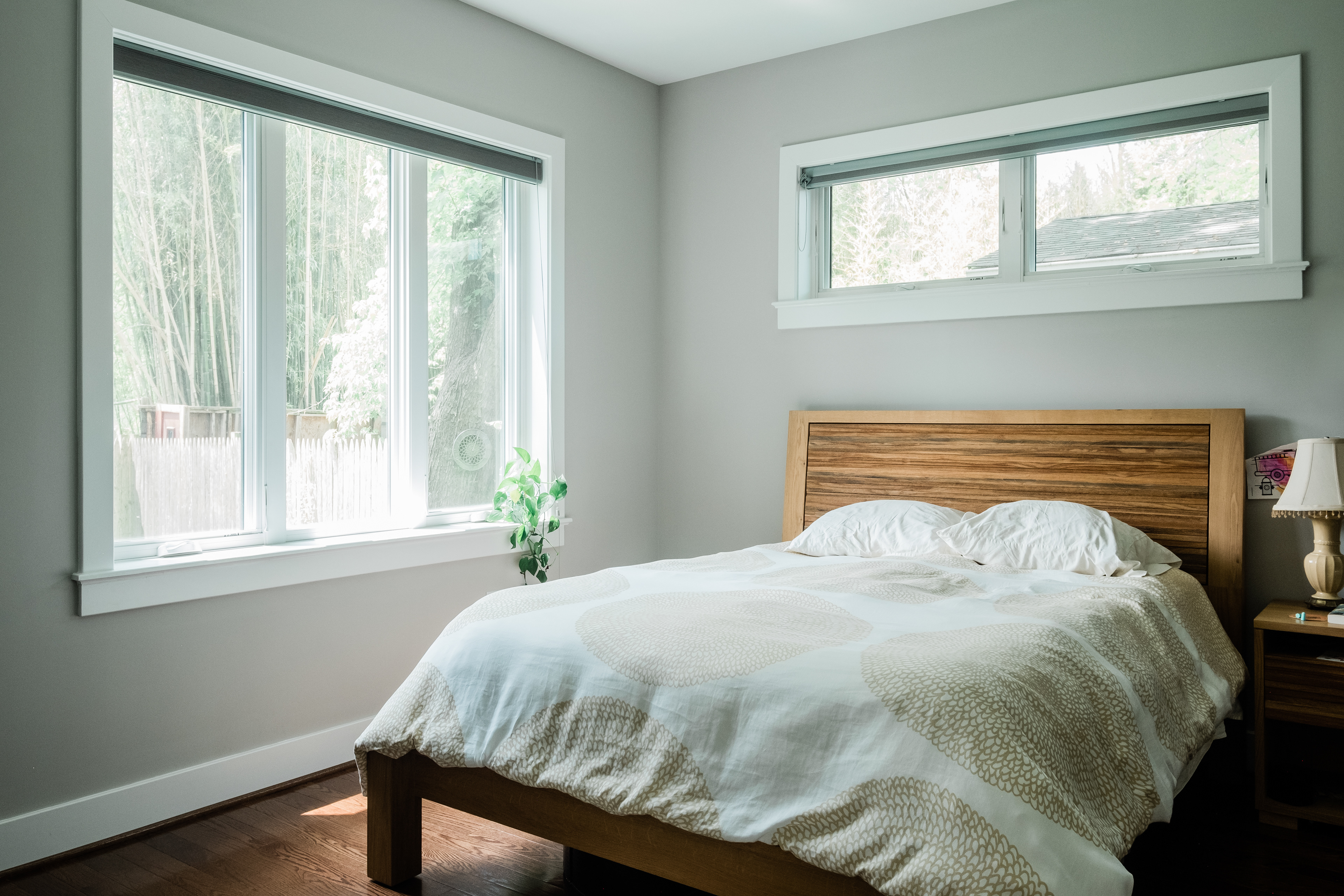 Main bedroom with ensuite bath on the first floor with view to the rear yard.