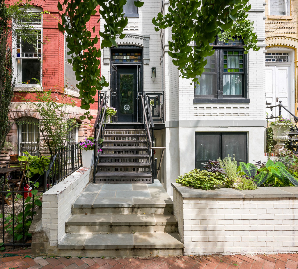 The front patio was replaced with a garden area of low water and low maintenance perennials, herbs and shrubs.