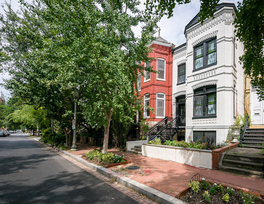 This townhome in an historic neighborhood has been gut renovated and rebuilt to achieve LEED Gold and Net Zero with installation of roof solar array.