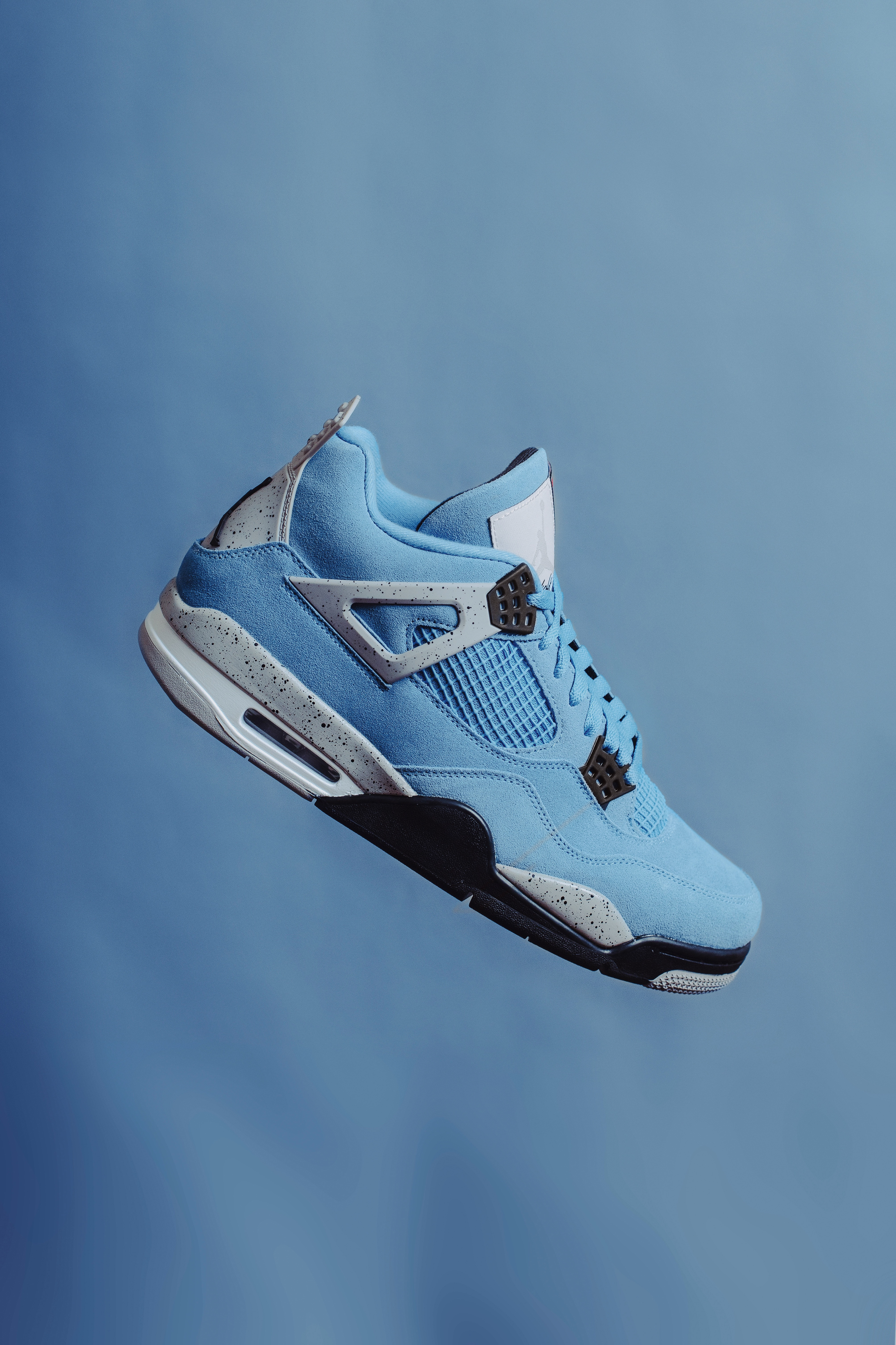 Test product shoot of the Jordan 4 Retro University Blue.