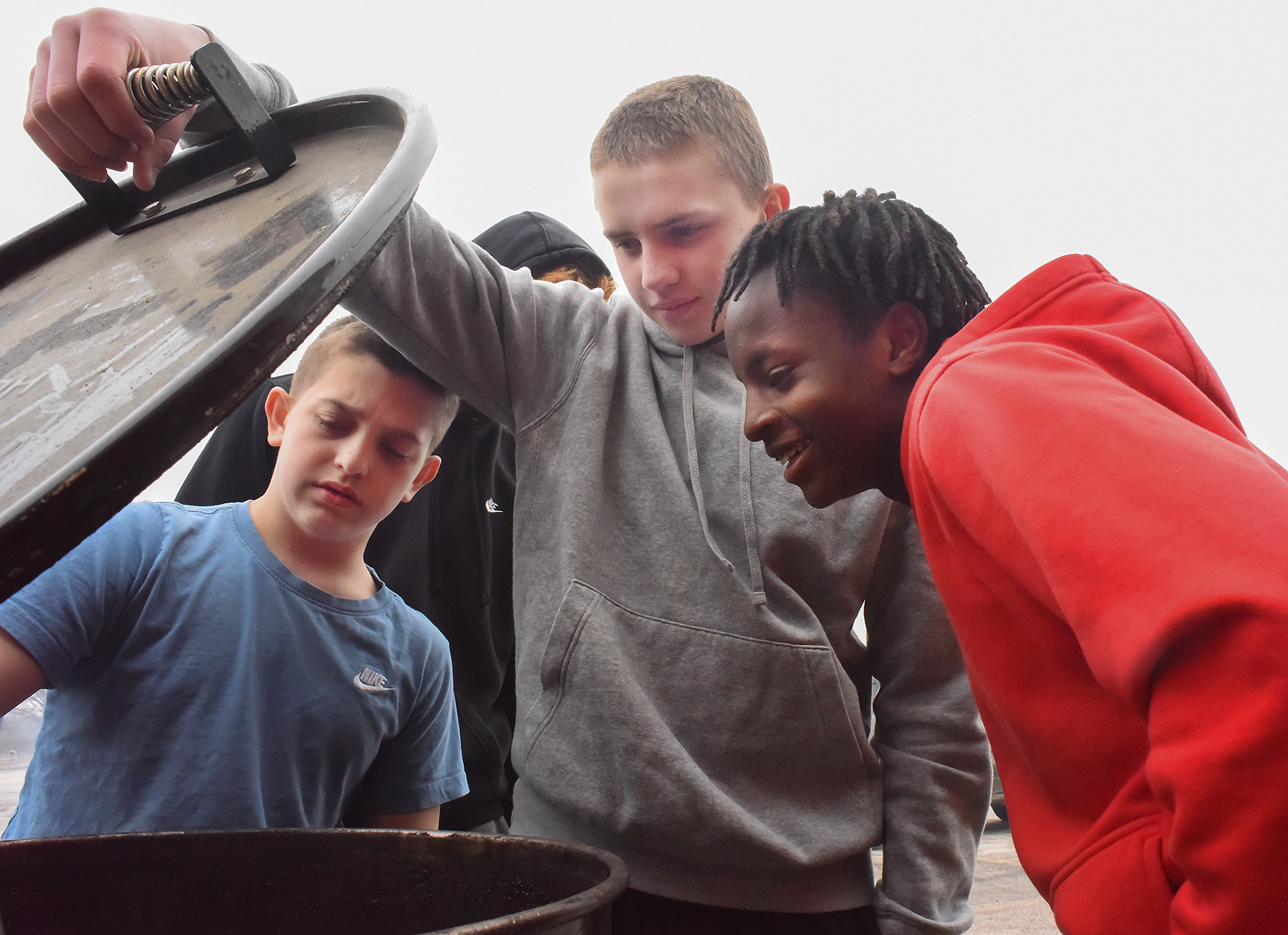 From left, Hallsville Middle School eighth graders Zane Wood, Evan Wildenhan and Micah Banks check on their ribs on March 2 at Hallsville High School. They were competing for spots on a new middle school barbecue team. Hallsville’s ag-ed program has more than 150 students this year.
