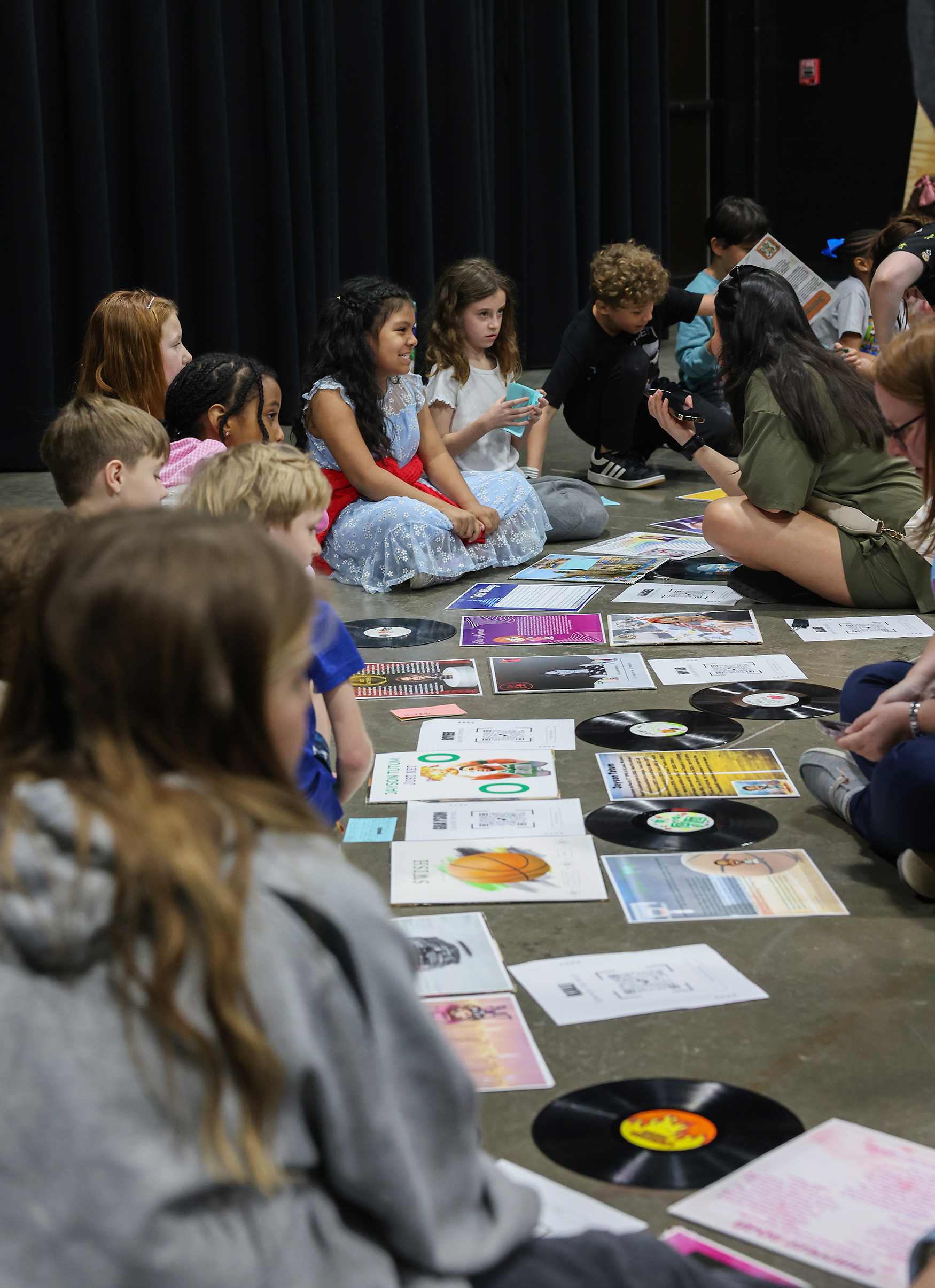 Meg Tummons' and Lindsey Woodcock’s third grade classes come together for the art gallery on March 20 at Locust Street Expressive Arts Elementary in Columbia. Parents had 30 minutes to converse with the students about their artwork and research.