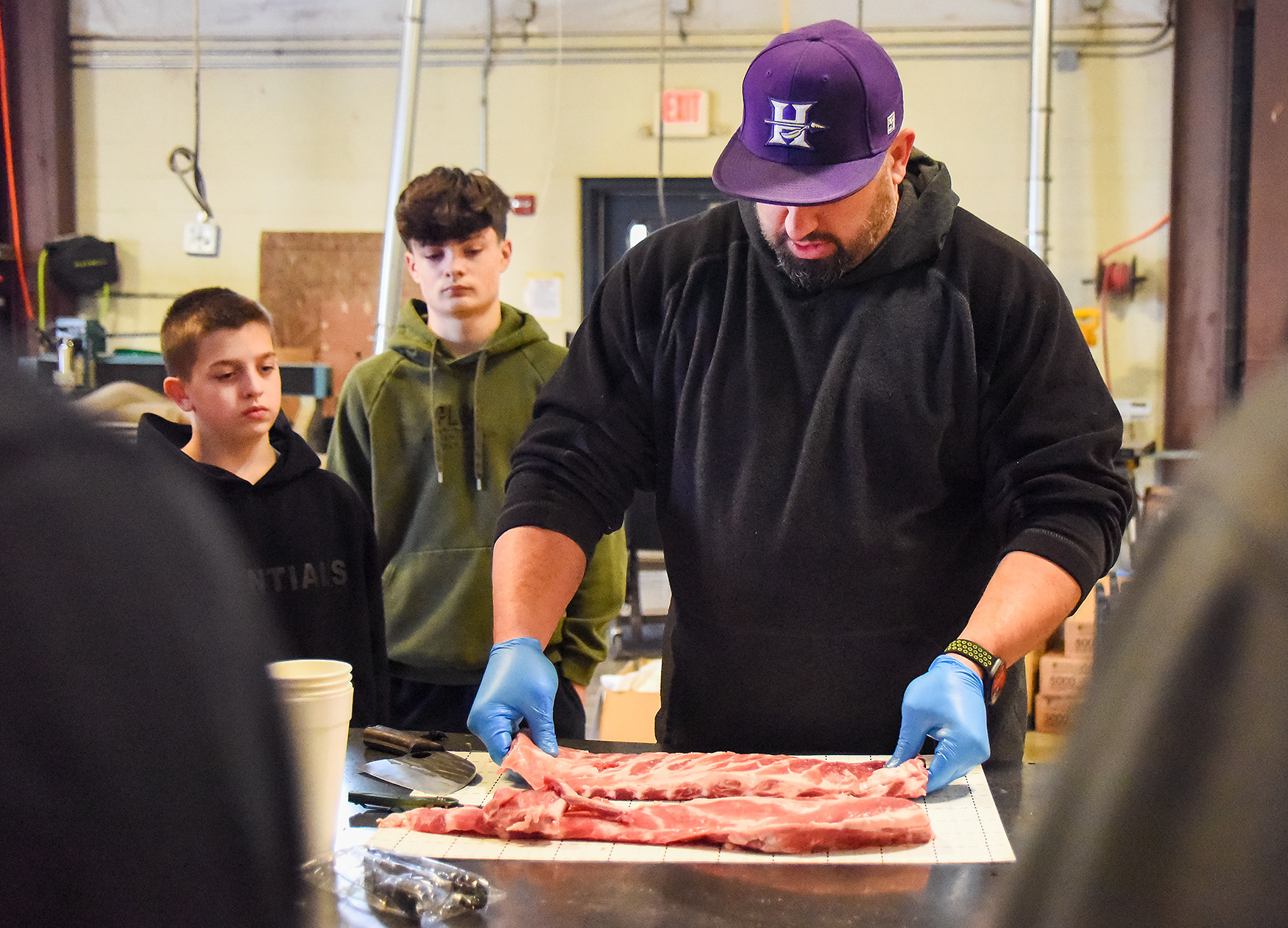 Travis Kinkade shows students how to square ribs on March 2 at Hallsville High School. Kinkade teaches physical education at Hallsville High School. Many teachers at the high school applaud the impact ag-ed classes have had on the students. “A lot of kids end up taking our class, then we set the hook in ‘em,” said Caleb Martin, one of the two main ag-ed teachers. “They’re with us all four years.”
