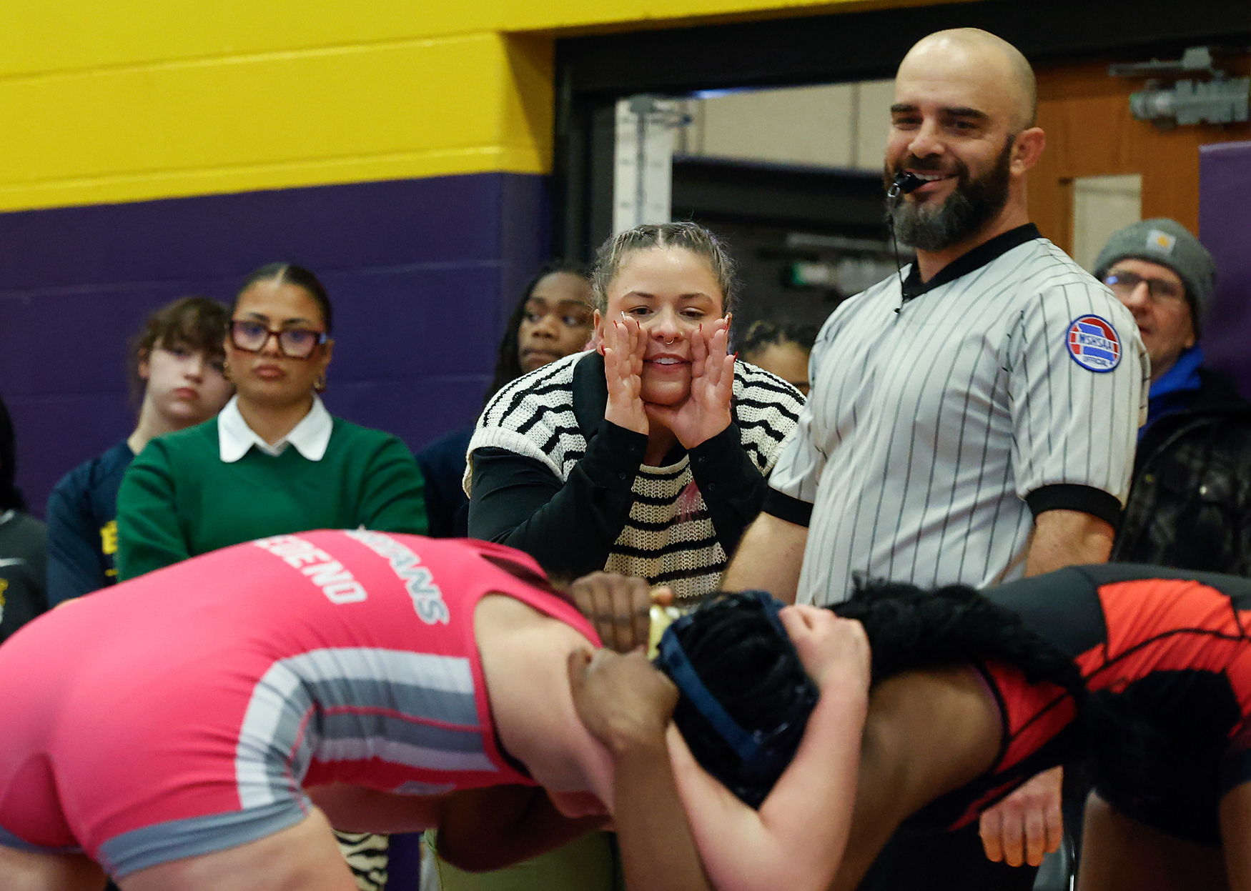 Kelsey Mescher calls out to Battle freshman Natalya Lakes during her bout against Jefferson City junior Jaiden Allen at the CMAC wrestling tournament on Jan. 31 at Hickman High School in Columbia.