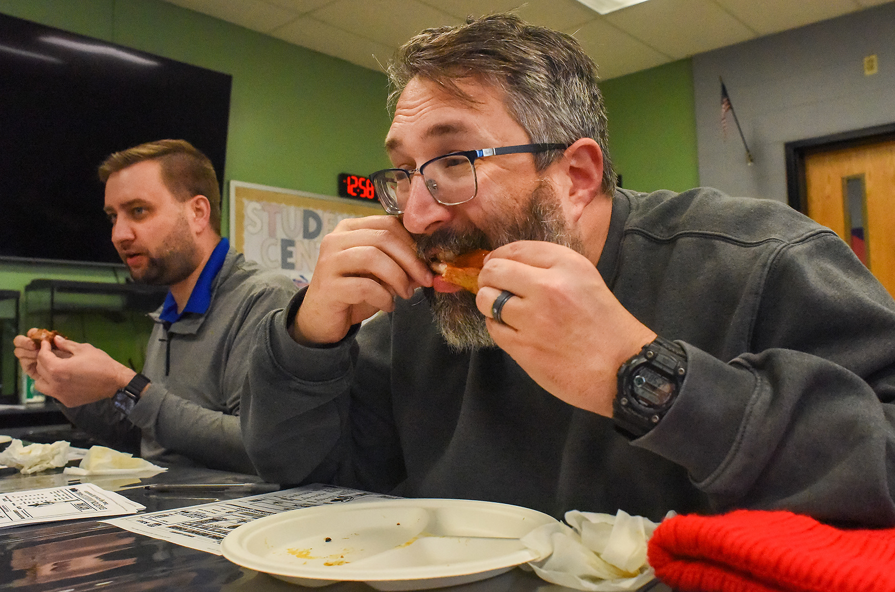 David Melton, one of the sponsors of Hallsville’s FFA team, bites into a rib on March 2 at Hallsville High School. Melton was one of four judges who tasted the students’ ribs and decided which six students would join a new middle school team. Not all, but many students who attend ag-ed classes are also in FFA. The school district has received multiple grants and community support for both FFA and the ag-ed program.