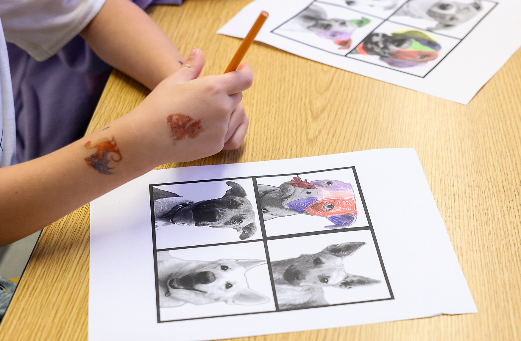 Benjamin Denzel, 6, works on his “Pop Art Pups” art project on April 16 at Ridgeway Elementary School. The artwork created by students is showcased at the school’s art show at the end of the school year.