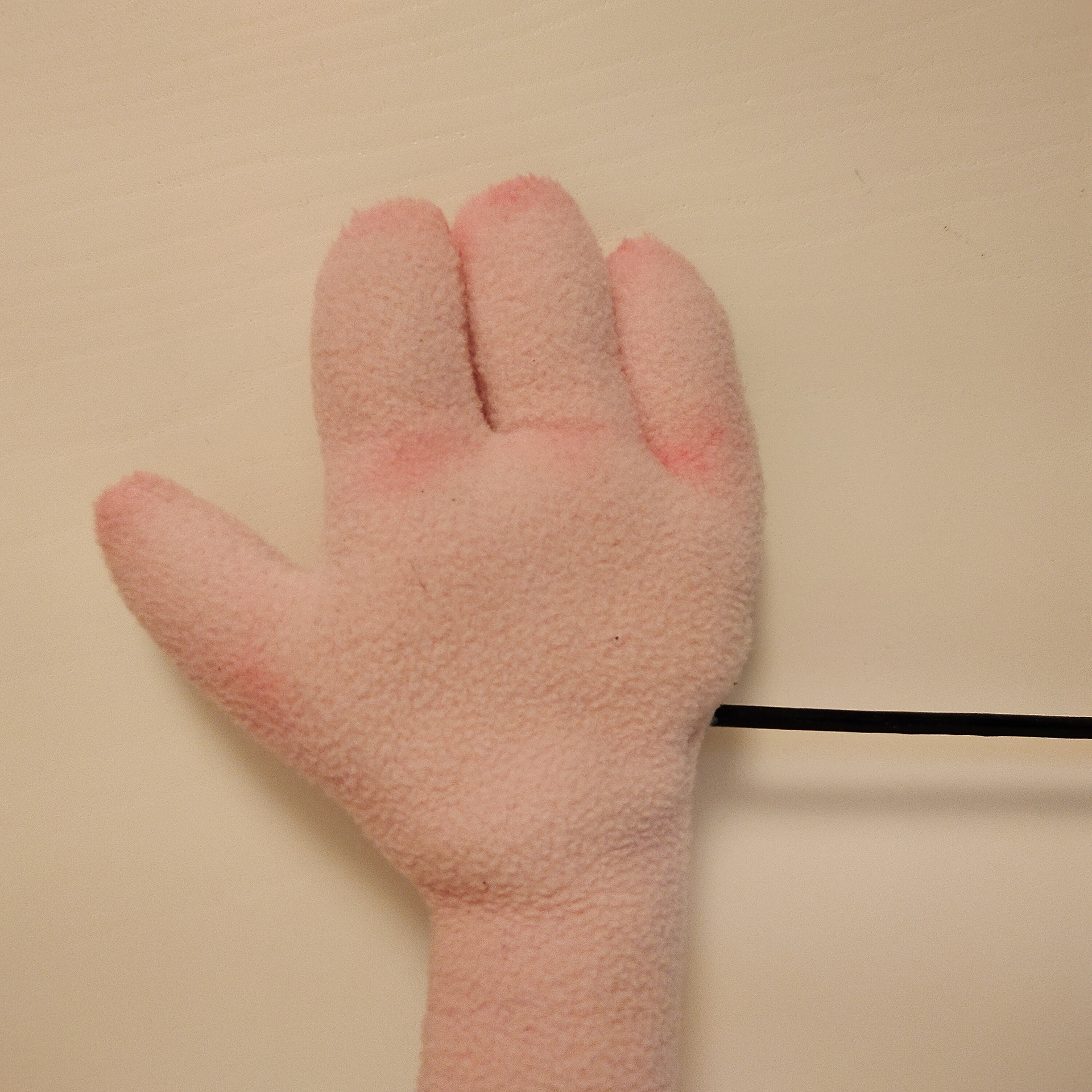 puppet hand blush with soft pastels