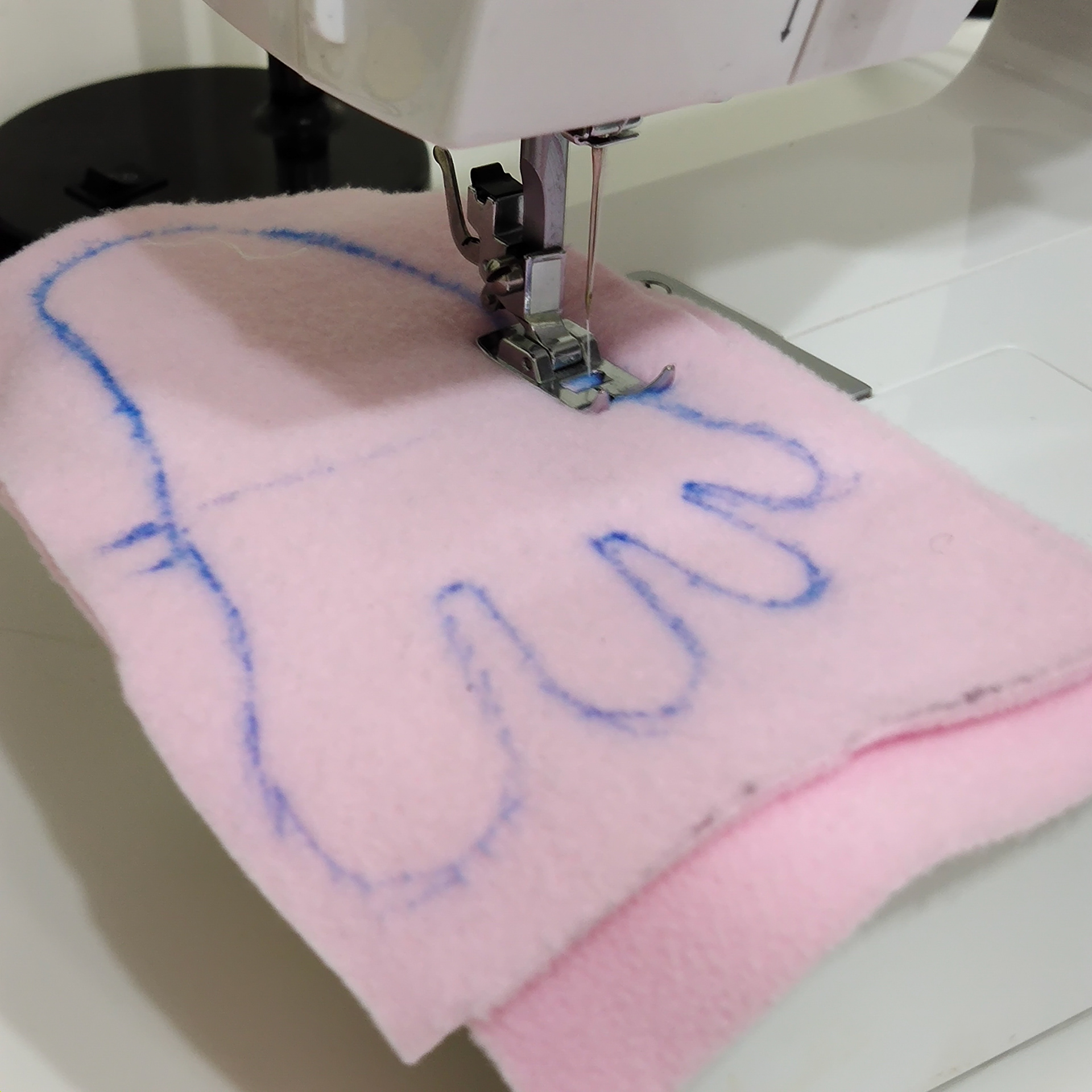 Puppet sewing the feet