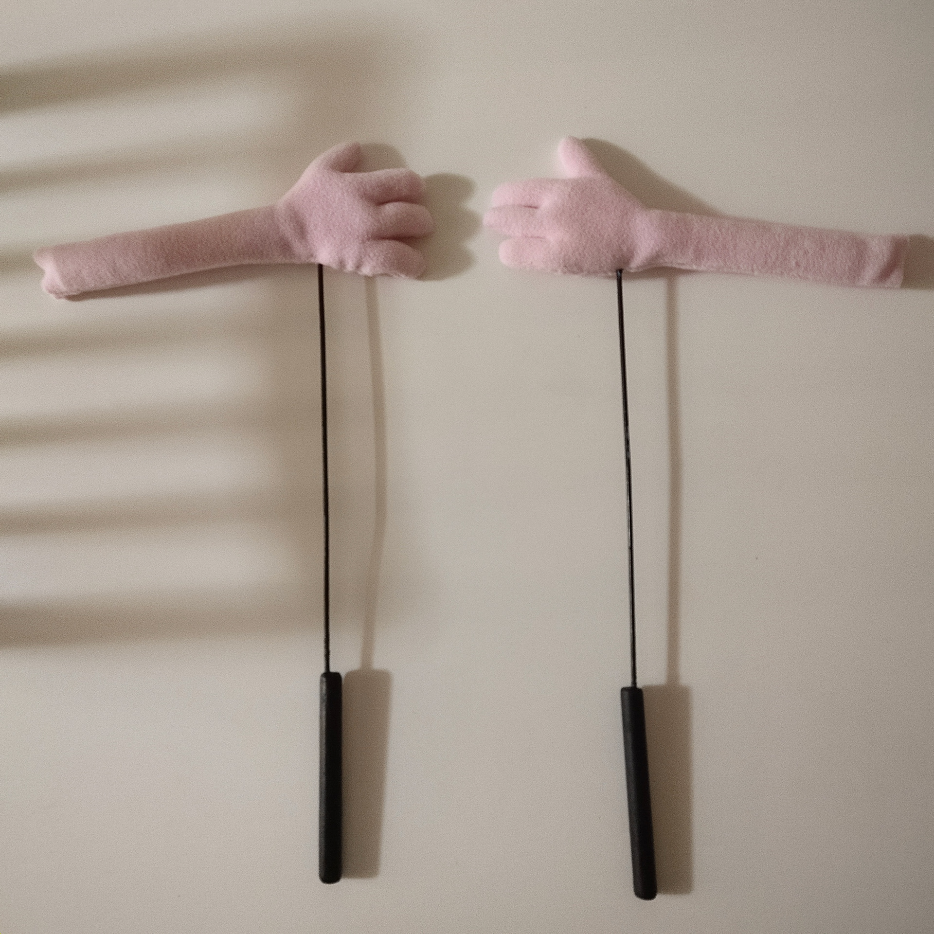 Puppet hand rods