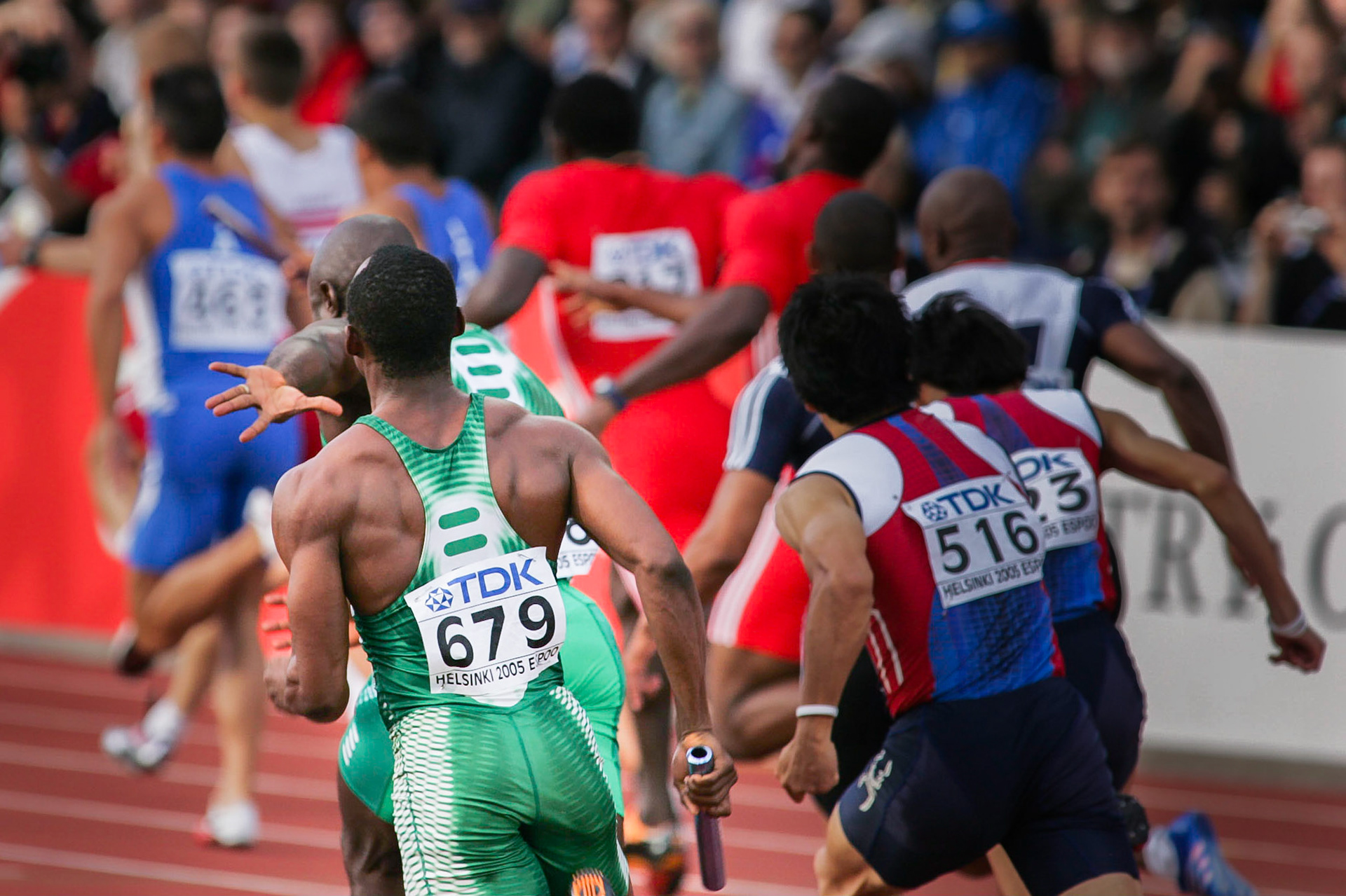 A change over in the 4x100 meter relay at the World Championship in Helsinki 2005.