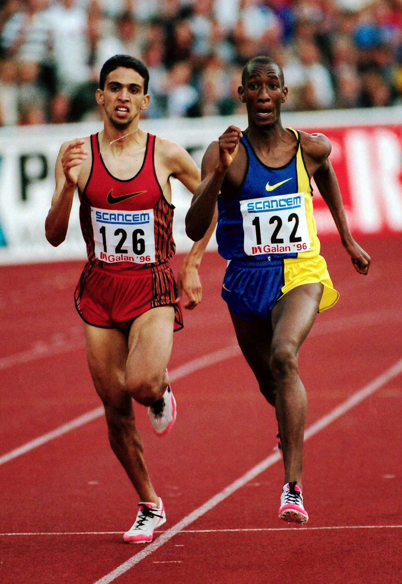 A hard battle over the home straight in the 1500 meter between Hicham El Guerrouj from Morocco and Venuste Niyongabo from Burundi in Stockholm 1996.