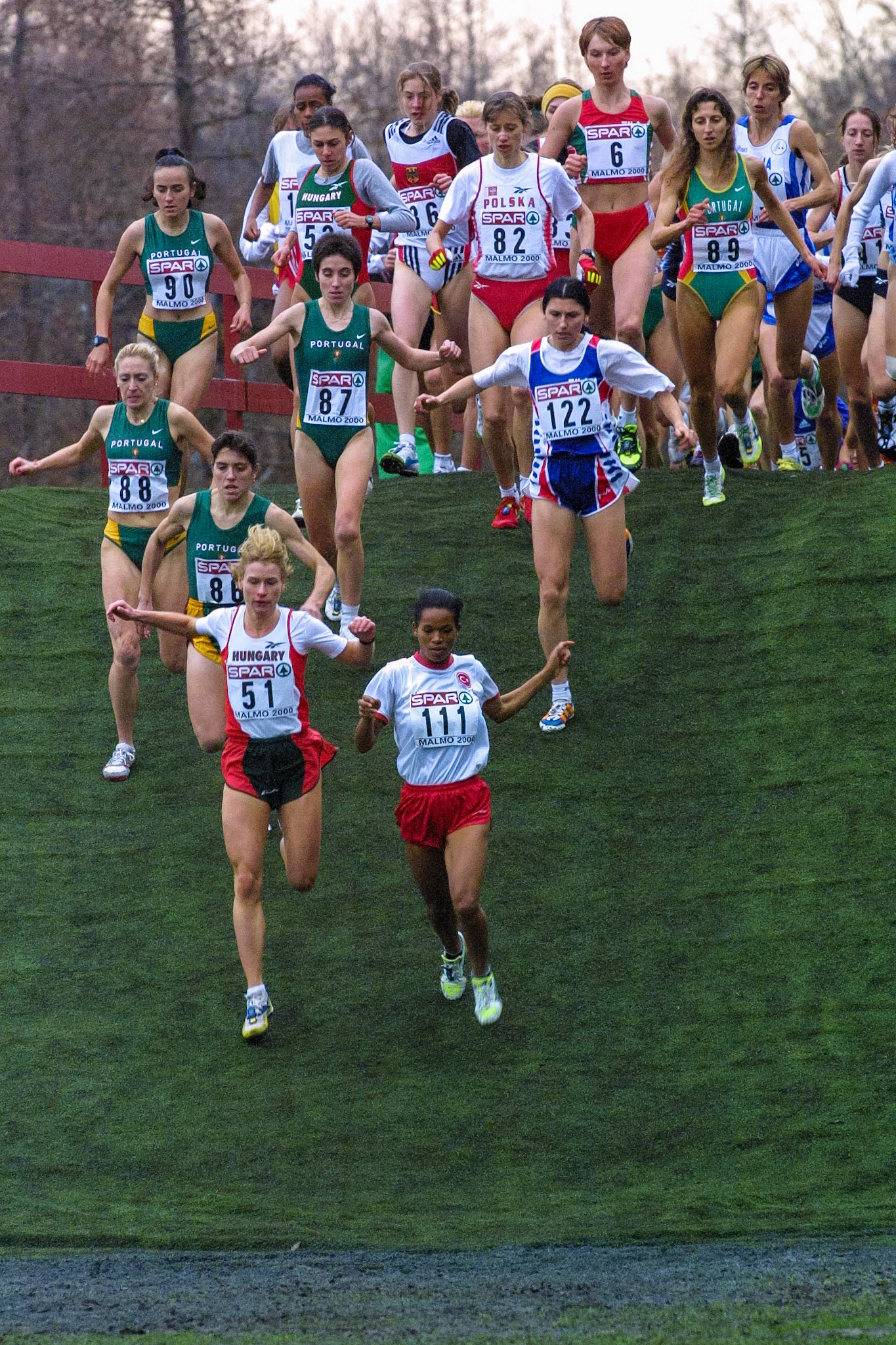 The womens race passing the artificial hill with the winner Hungarian Katalin Szentgyörgyi (51) in the front at the European Cross Country championship in Malmö 2000.