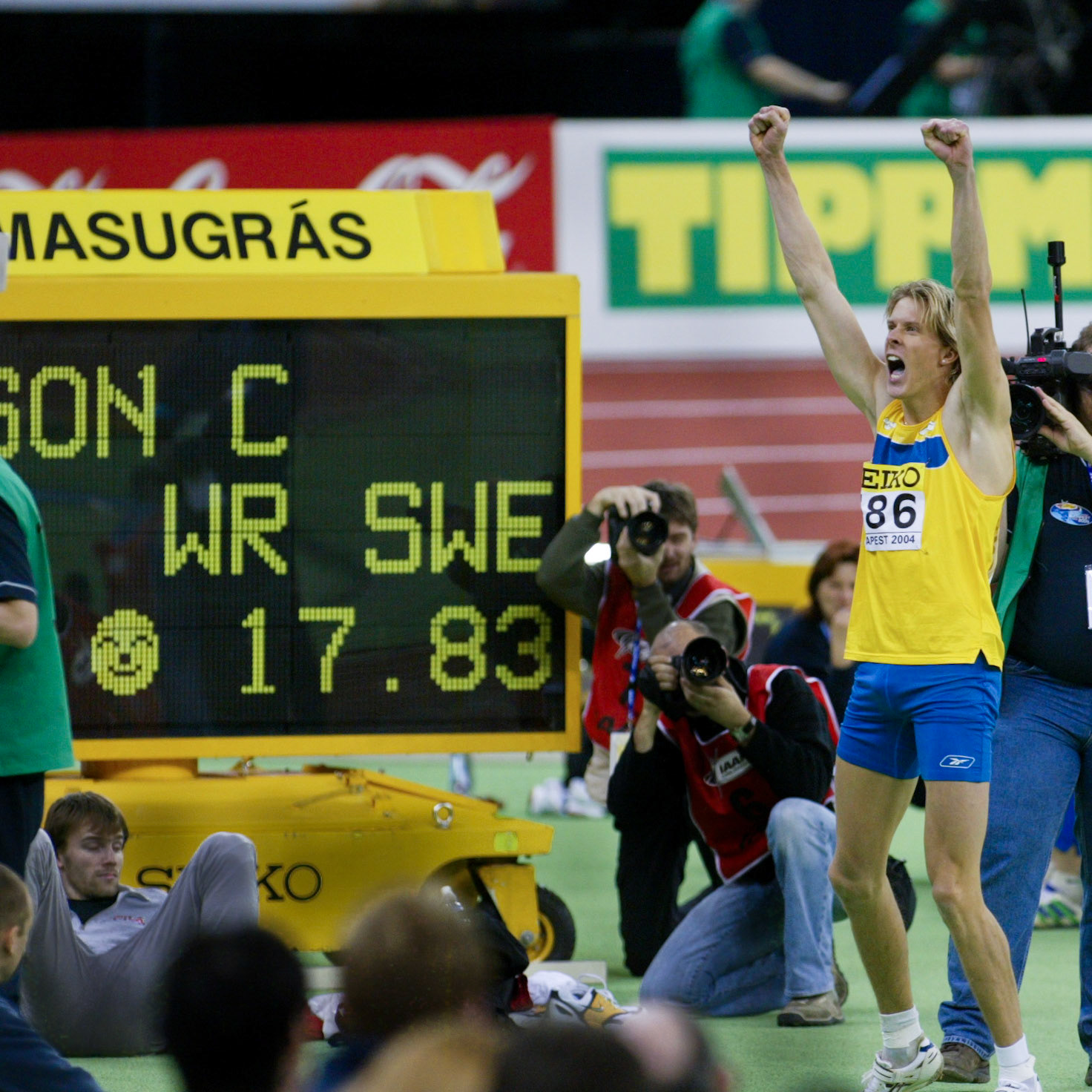 Christian Olsson celebrating after equalling the world record with 17.83 in the triple jump at the World Indoor Championship in Budapest 2004.