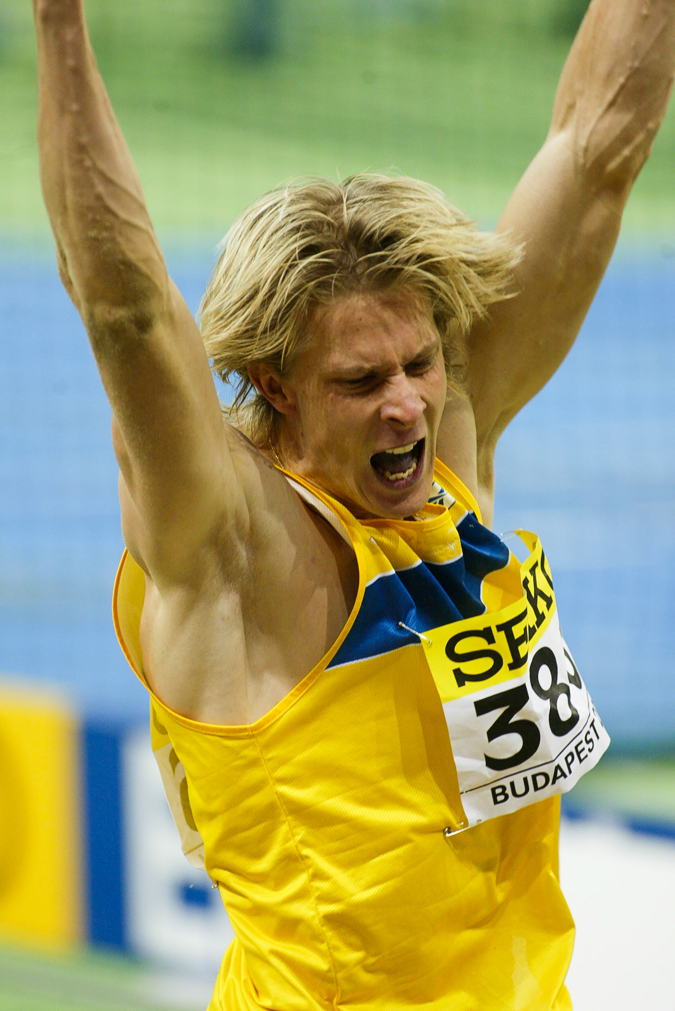 Christian Olsson celebrating after equalling the world record with 17.83 in the triple jump at the World Indoor Championship in Budapest 2004.