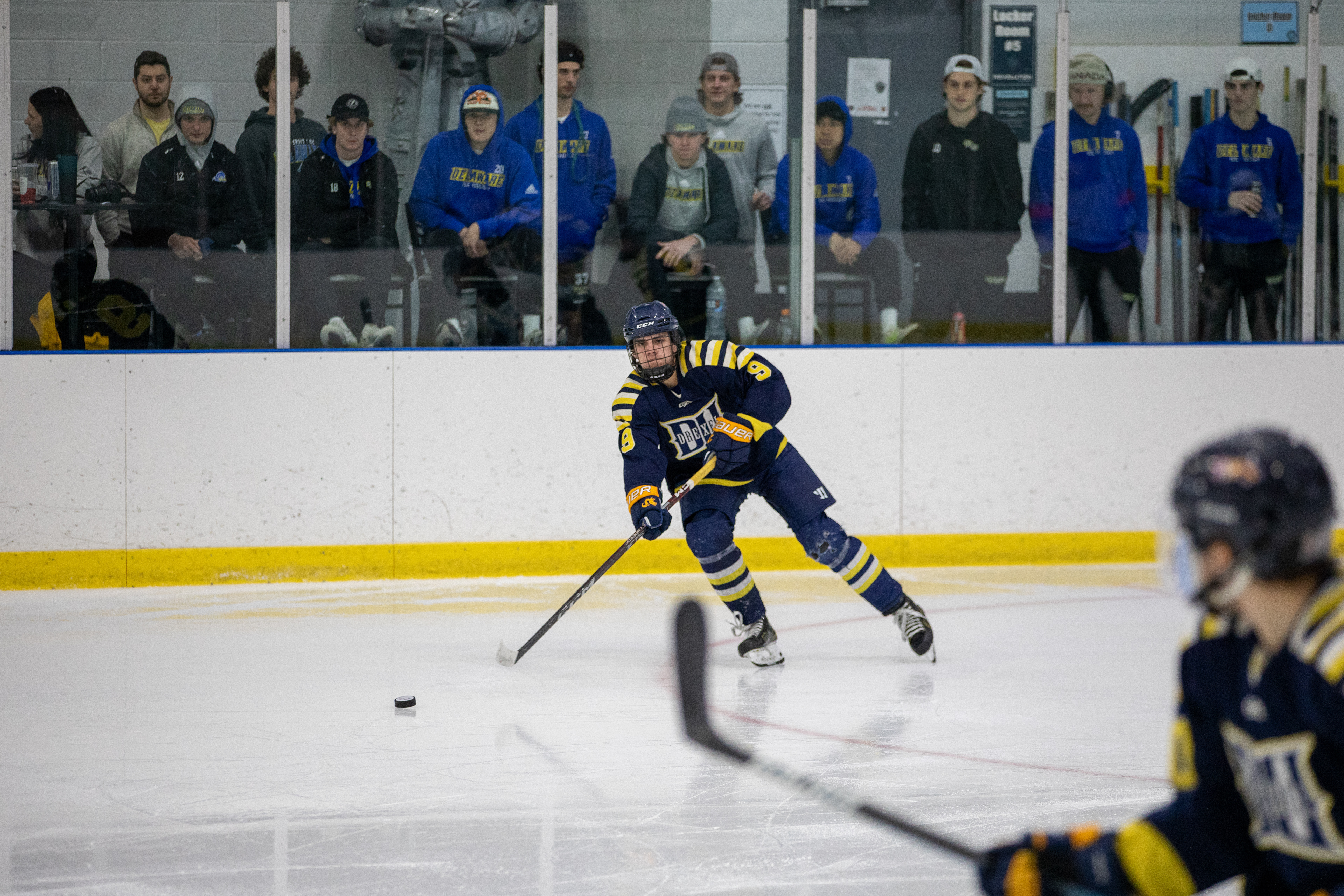 Drexel D1 Forward #9 Barrett Genovese makes a pass to #21 Sean Carver against the University of Rhode Island on 03/04/2023.