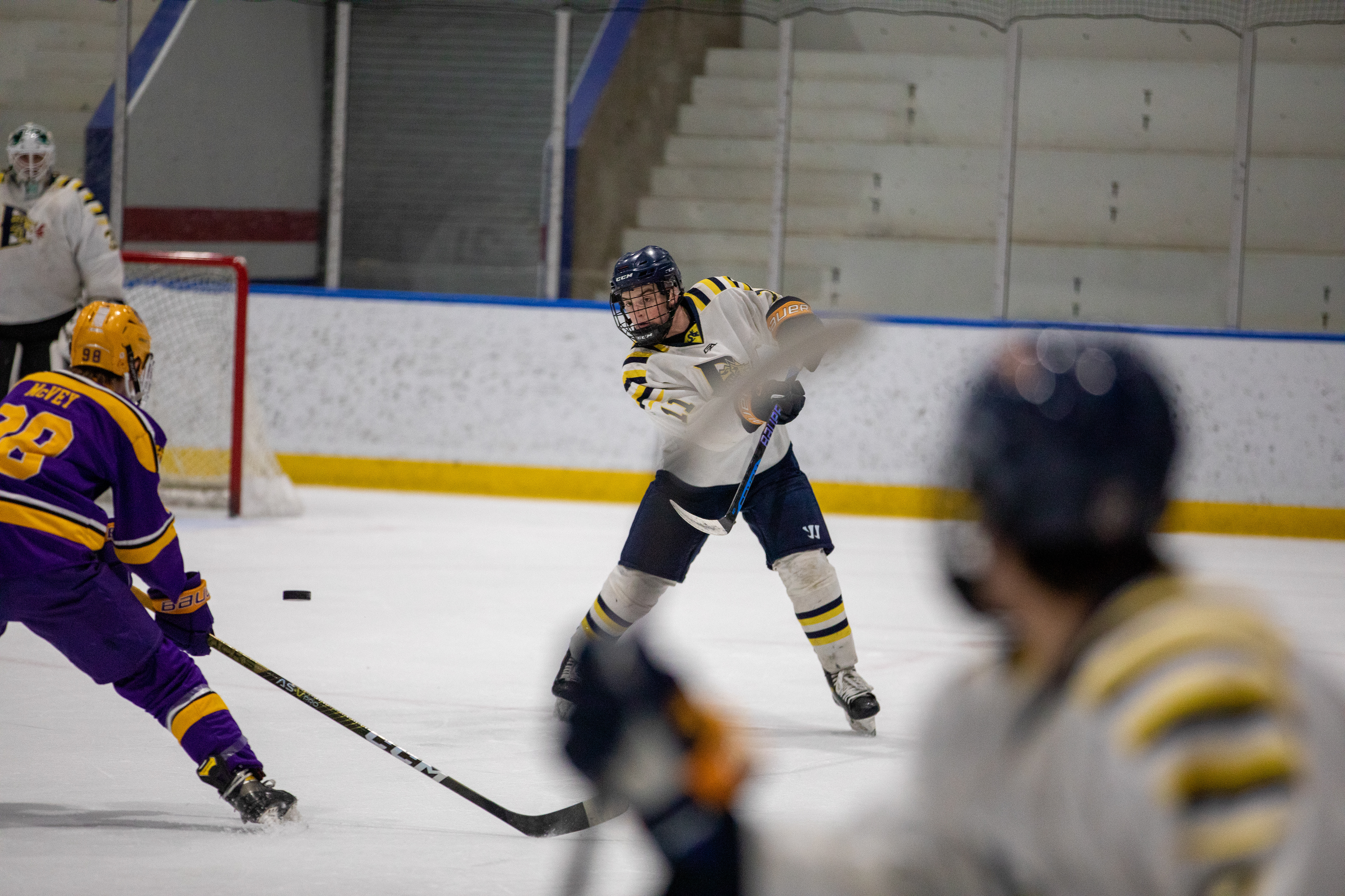 Drexel D1 Defenseman #11 Ben Birkhahn with a floating pass against West Chester University on 02/24/2023.