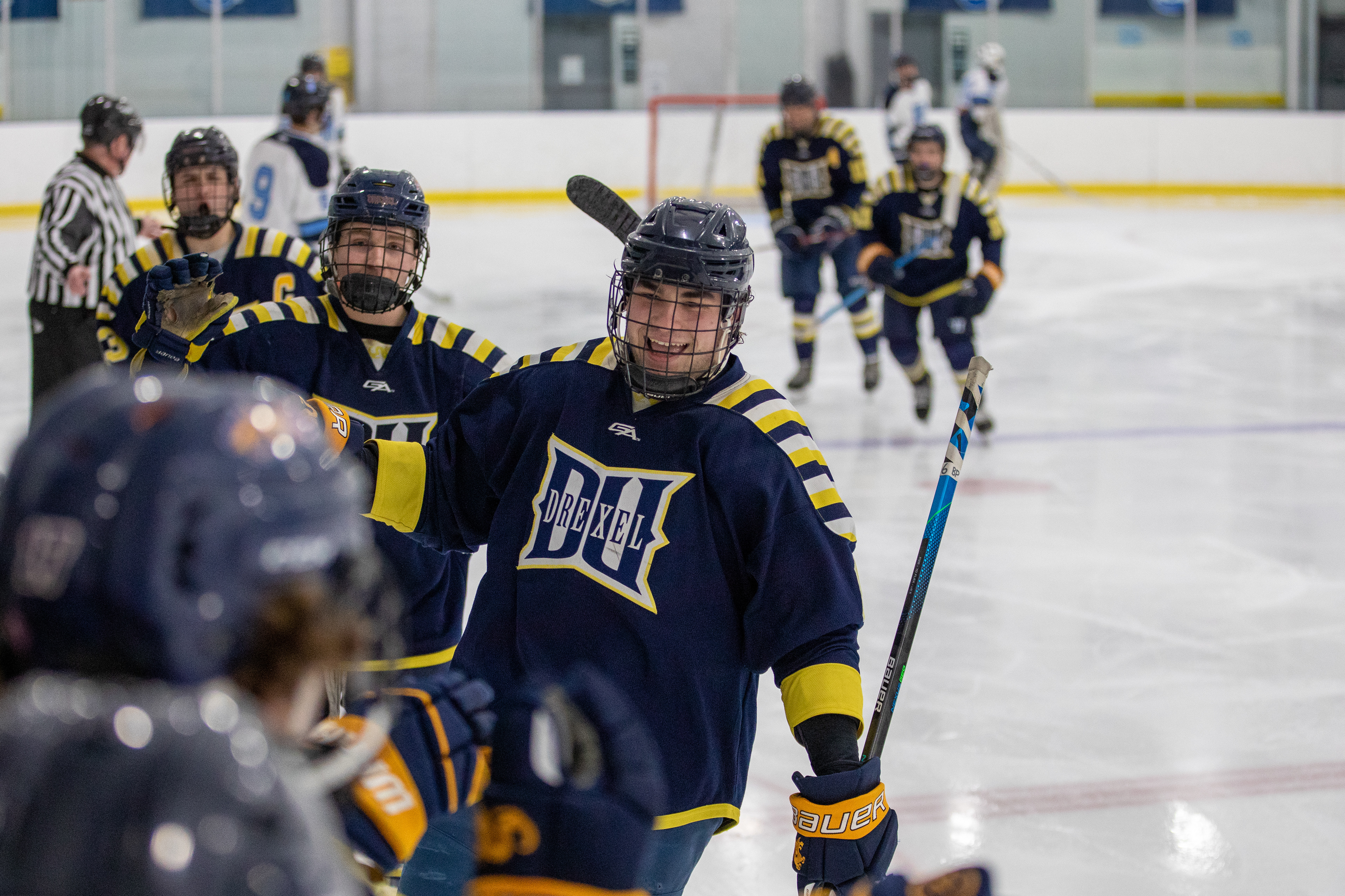 Drexel D1 Forward #6 Matt Harris coming down the bench after he scores a goal against the University of Rhode Island during our playoff game on 03/04/2023.
