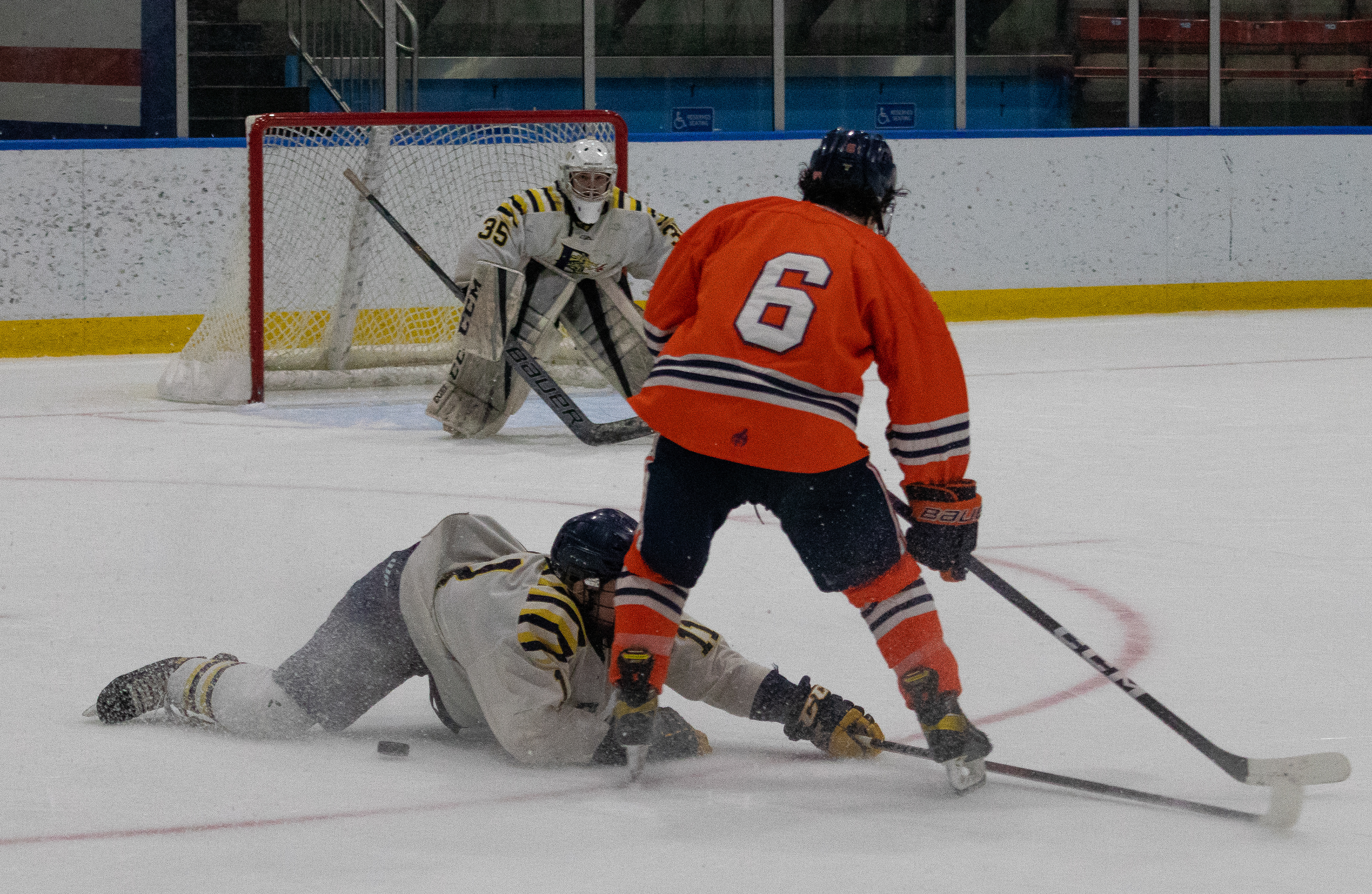 Drexel D1 Defenseman #11 Ben Birkhahn makes a diving block to stop a 2-on-1 man attack on 01/13/2023.