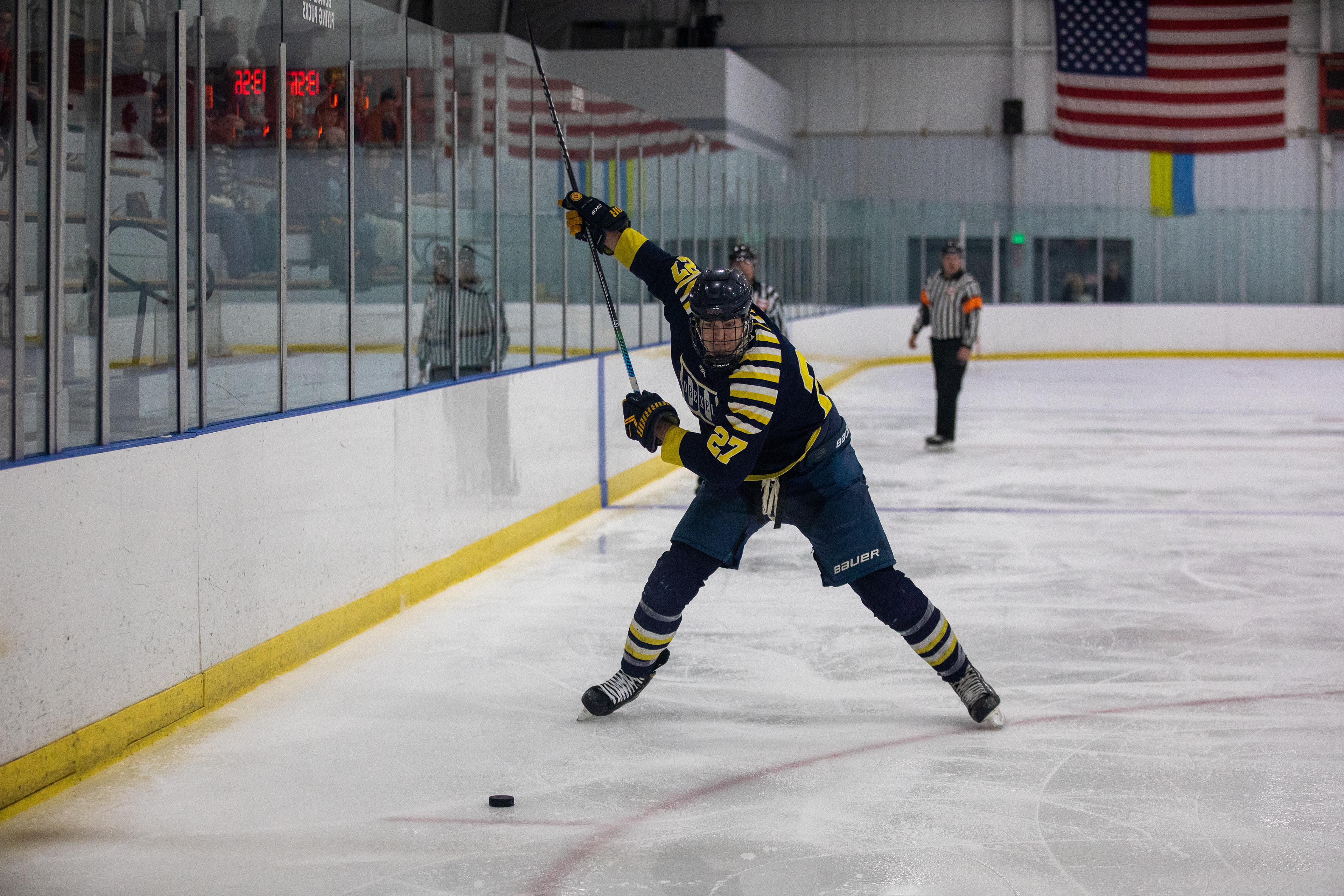 Drexel D1 Defenseman #27 Ian Huver with a slapshot against the University of Rhode Island on 03/04/2023.