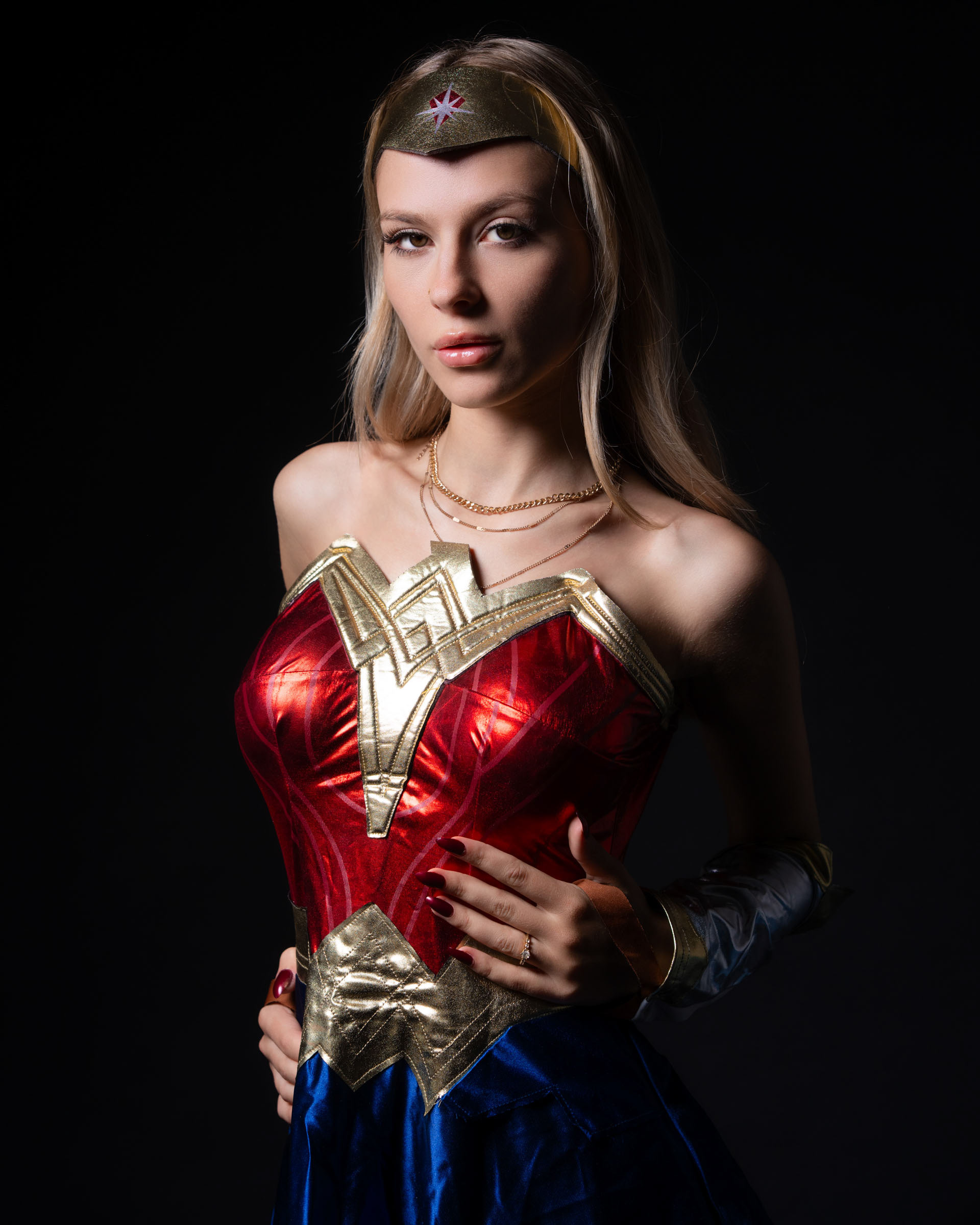 Close-up of chest plate, textures and golden accents.