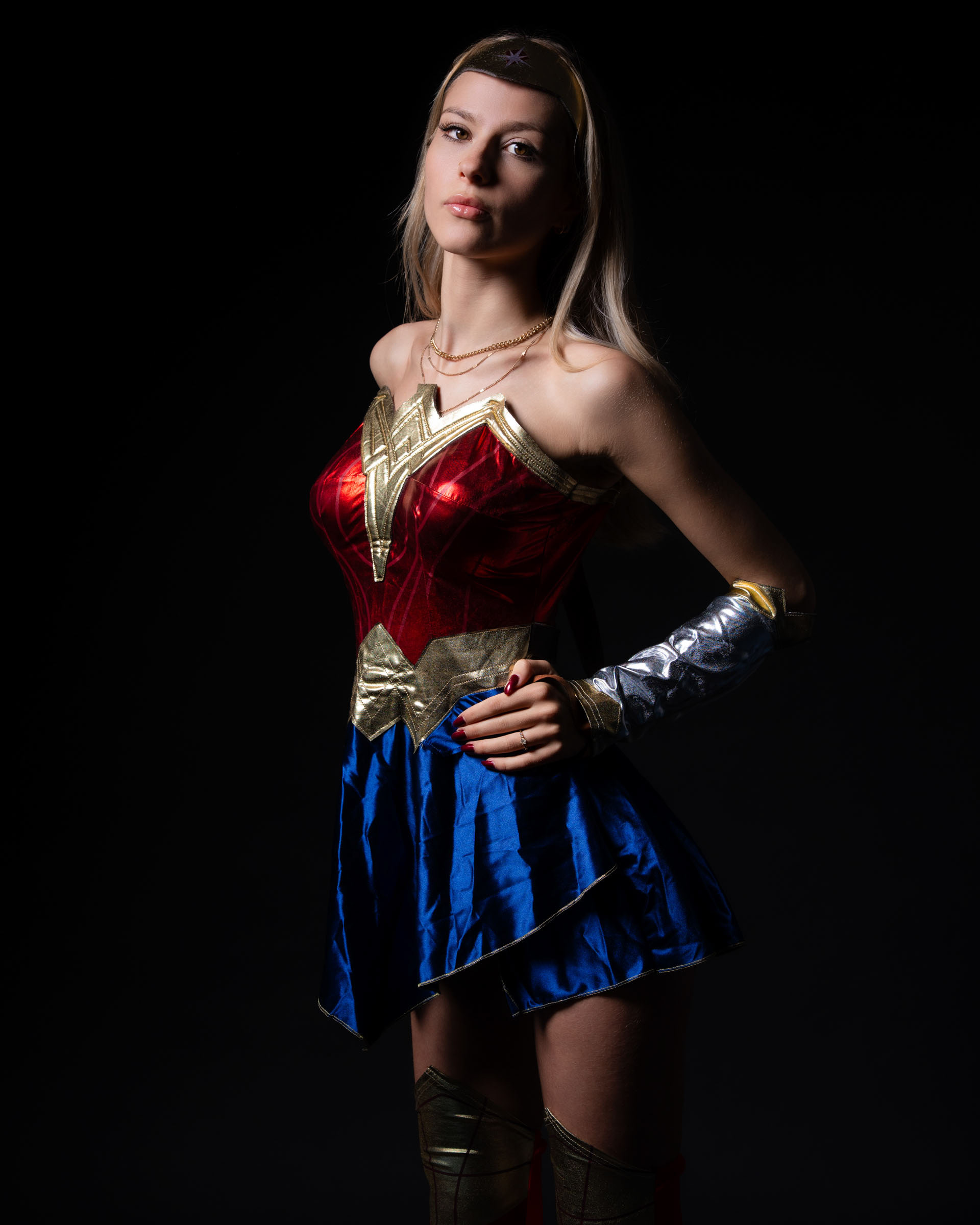 Side profile capturing the armor details and strong stance.