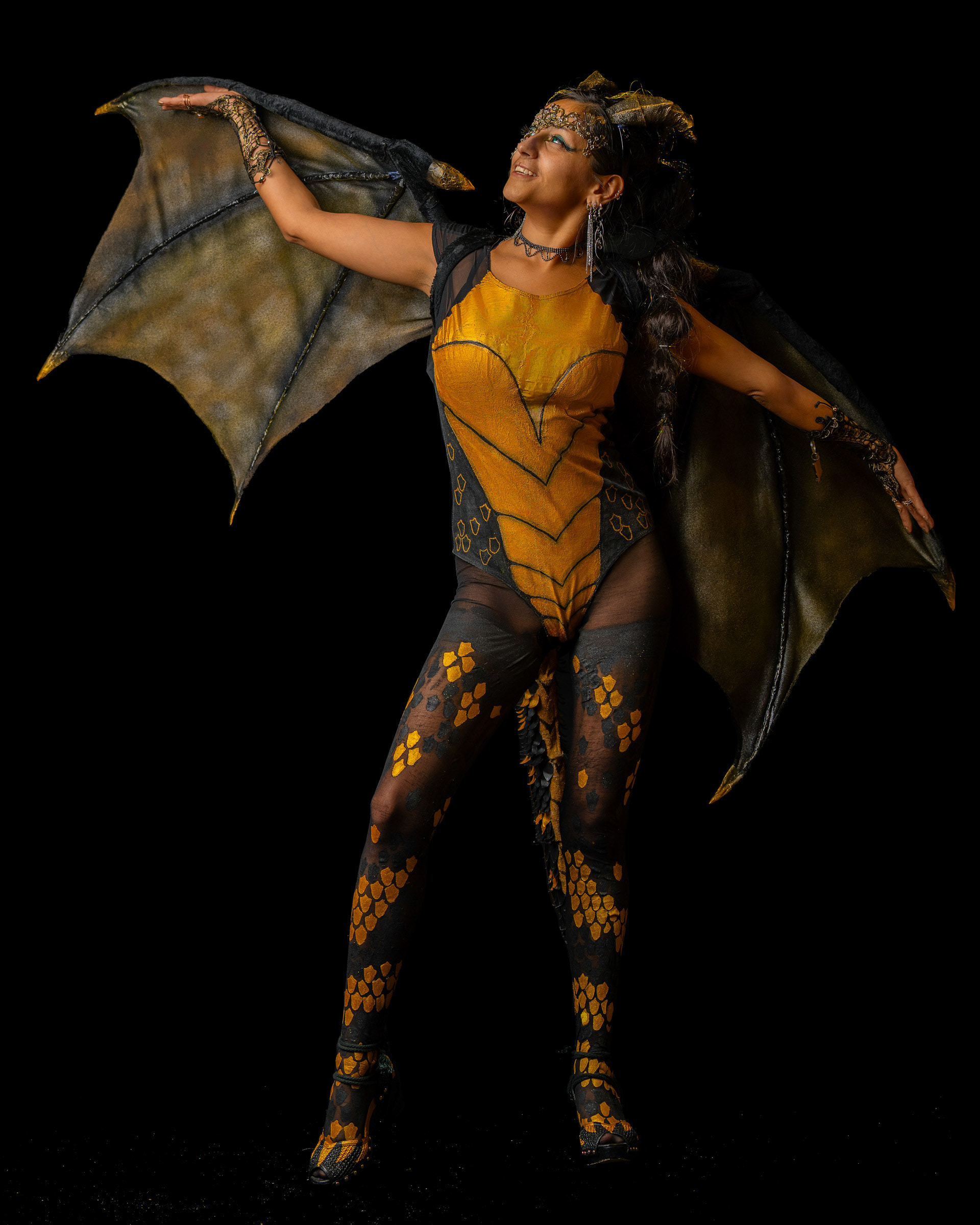 Full body fantasy cosplay photoshoot featuring Maribel in character pose in studio setting