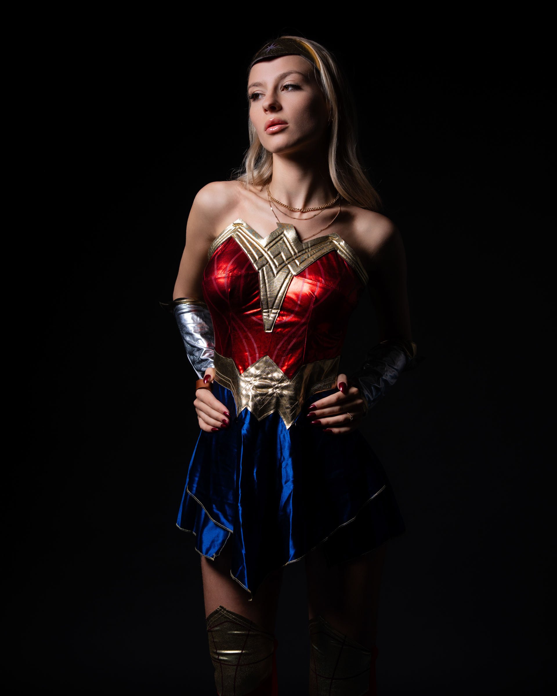 View showing costume design and structured silhouette.