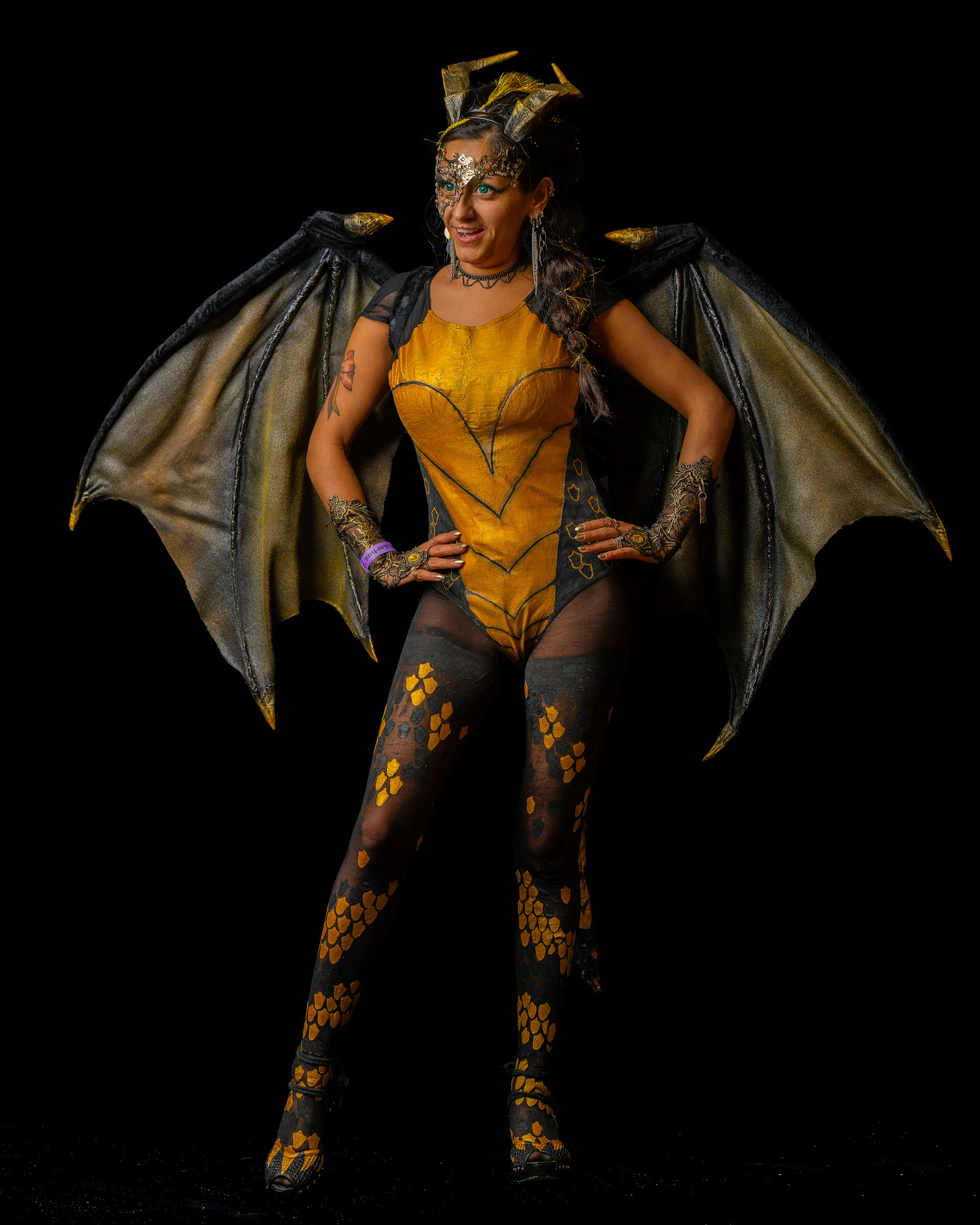 Creative studio portrait of Maribel in fantasy cosplay costume with wings and cinematic lighting