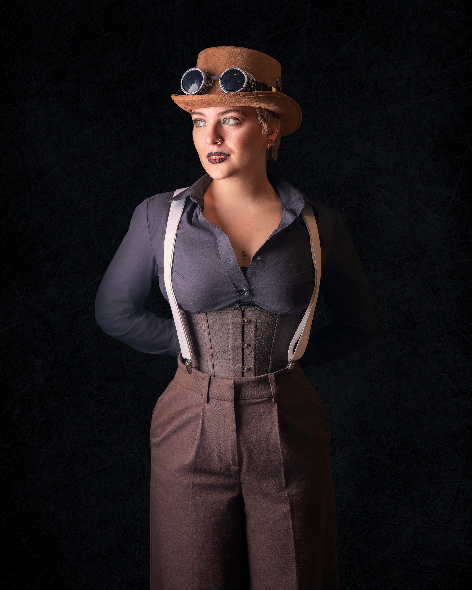 Cinematic steampunk portrait of Tirza captured in controlled studio lighting