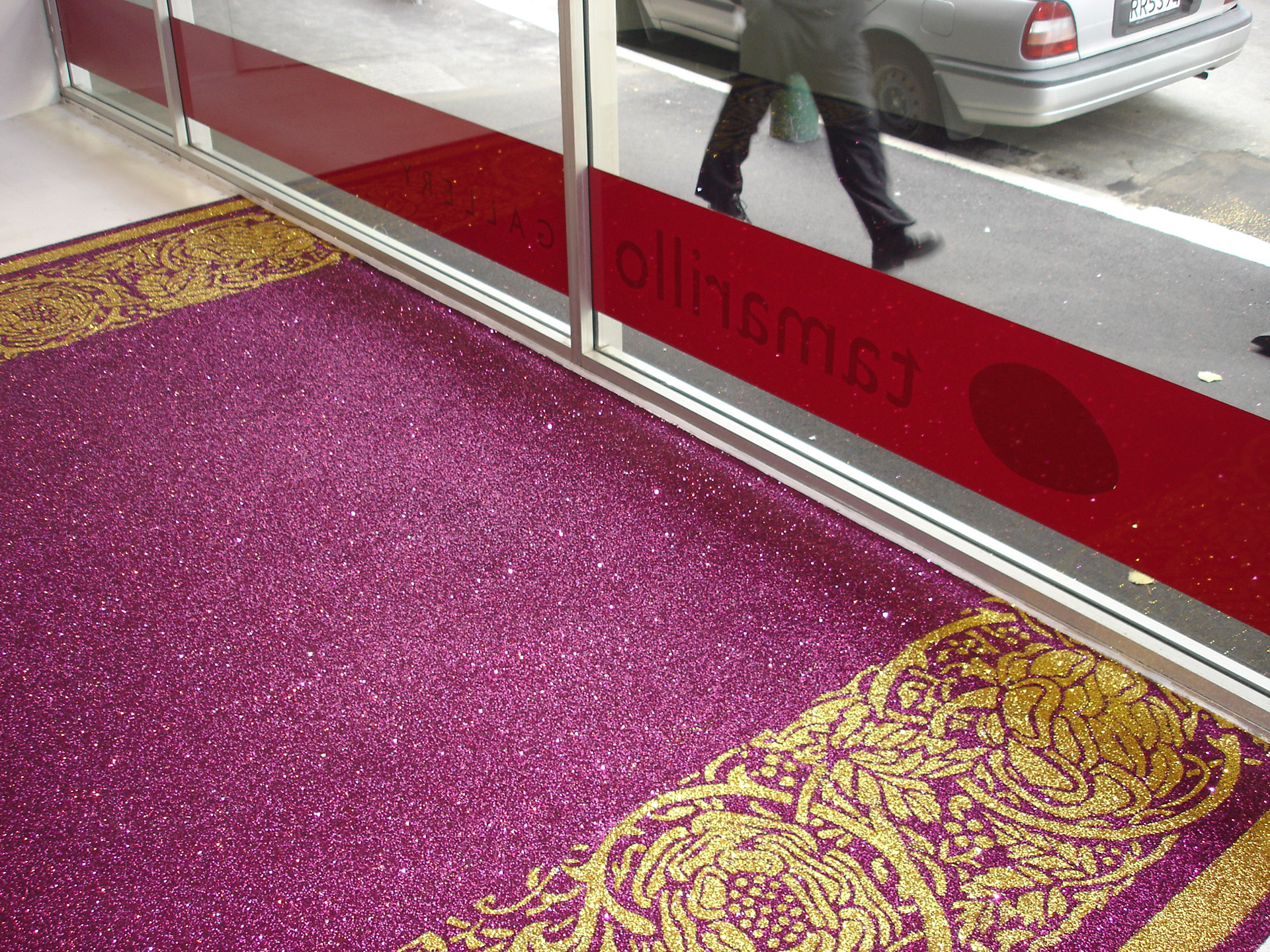 Temporal glitter carpet installation main front window of gallery