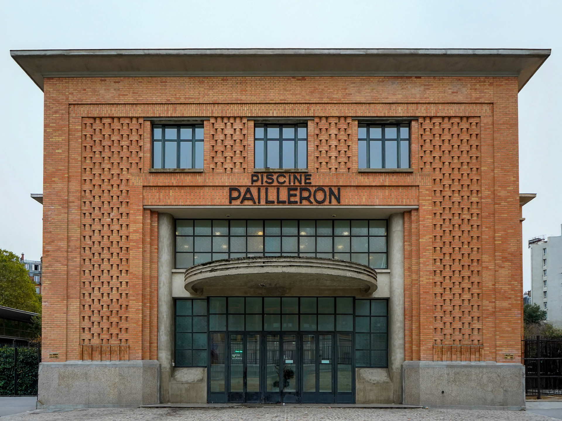 Paris, October 16, 2024, the facade of the Piscine Edouard Pailleron swimming pool building in the 19th arrondissement. Photography by Lageat Perroteau / Hans Lucas.Paris, le 16 octobre 2024, la facade du batiment de la piscine Piscine Edouard Pailleron dans le 19 ème arrondissement. Photographie par Lageat Perroteau / Hans Lucas.