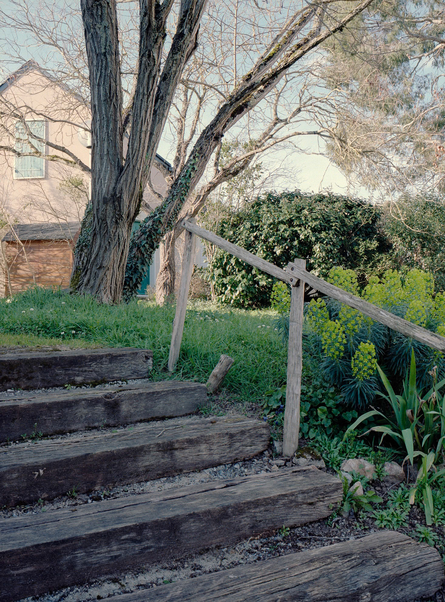 France, Angers, 2021-03-01. An outdoor staircase in the collective garden of the cohousing project Pour un habitat different. This collectively managed housing was designed in the 1980s by a group of people eligible for social housing and the architect Jacques Levy, who wanted to collaborate in this social experiment. Photograph by Lageat Perroteau / Hans Lucas.France, Angers, 2021-03-01. Un escalier d exterieur dans le jardin collectif de l habitat participatif “Pour un habitat different”. Cet habitat gere collectivement a ete concu dans les annees quatre-vingt par un groupe de personnes eligibles aux logements sociaux et par l architecte Jacques Levy, alors desireux de collaborer a cette experience sociale. Photographie par Lageat Perroteau / Hans Lucas.