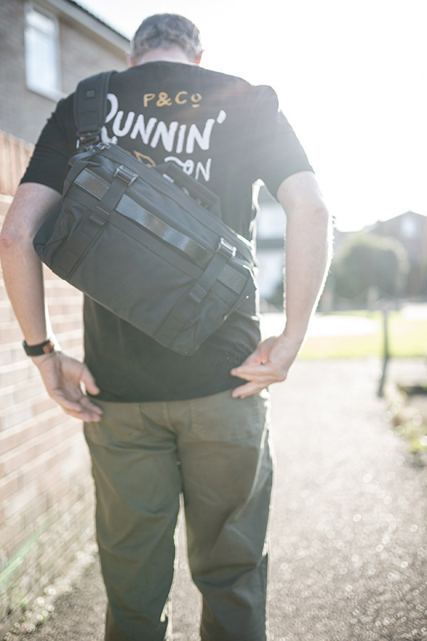 Wearing the black camera bag crossbody