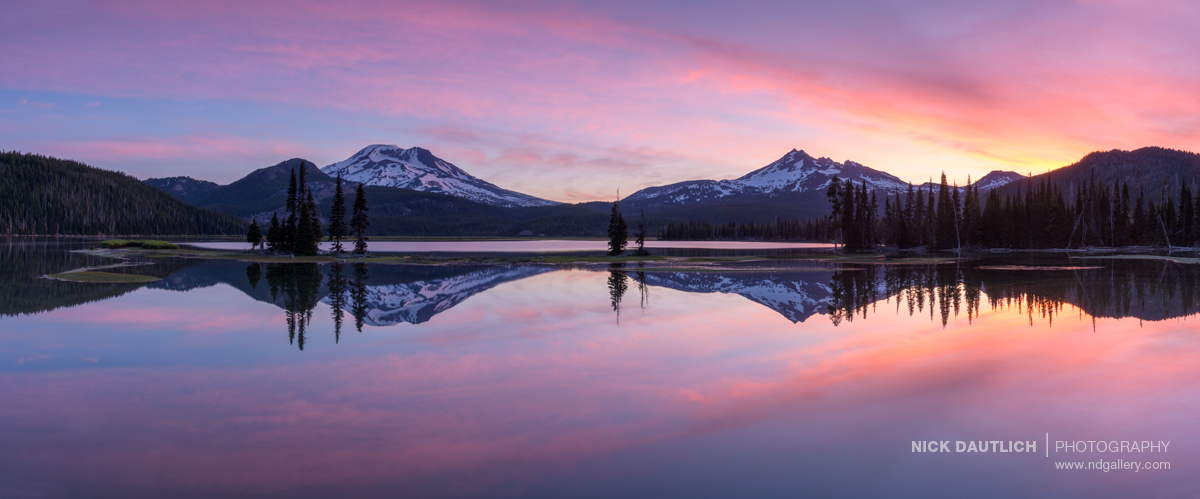 panorama from Sparks Lake with mountains framing still lake view