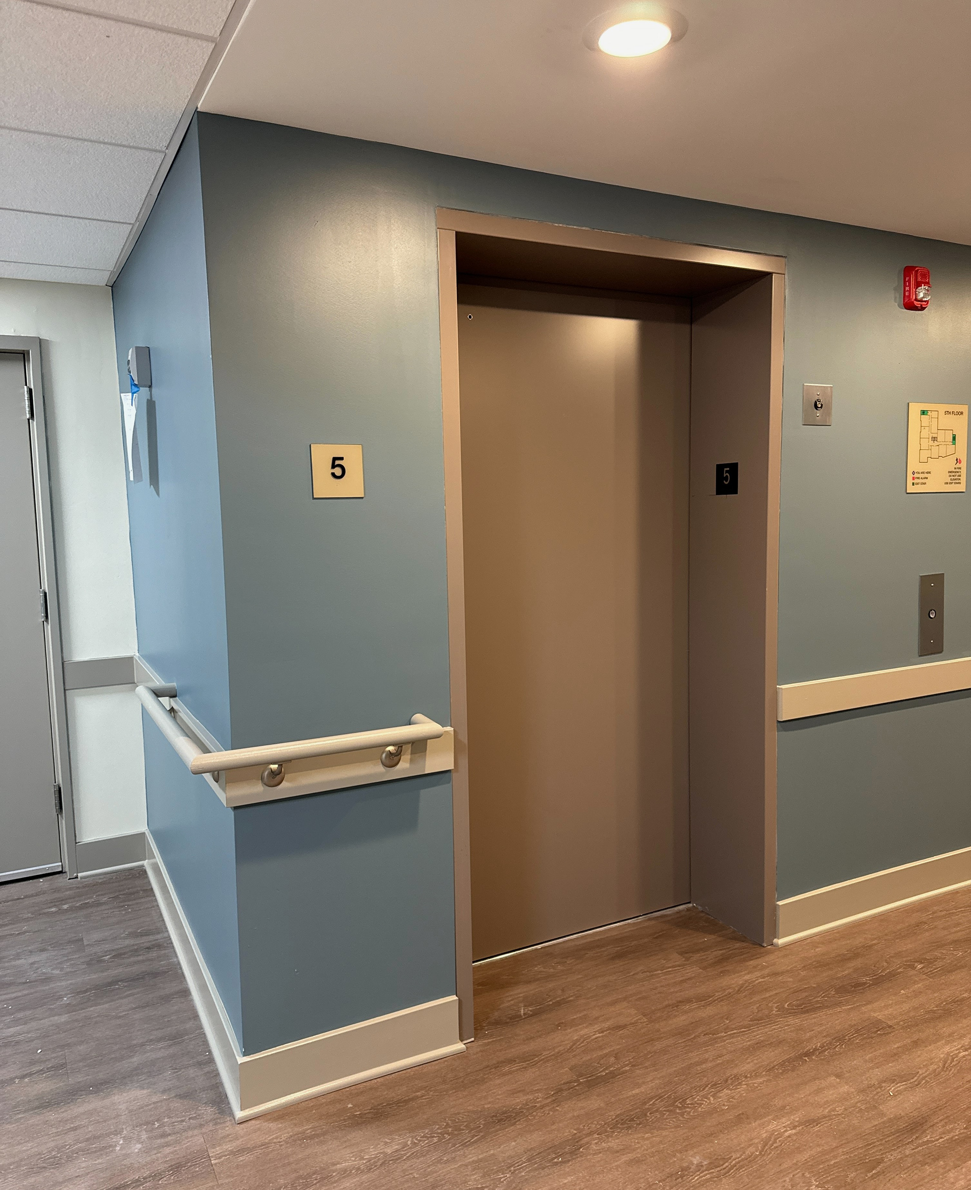 CORRIDOR HANDRAIL/CHAIR RAIL COMBO & WOOD BASEBOARD