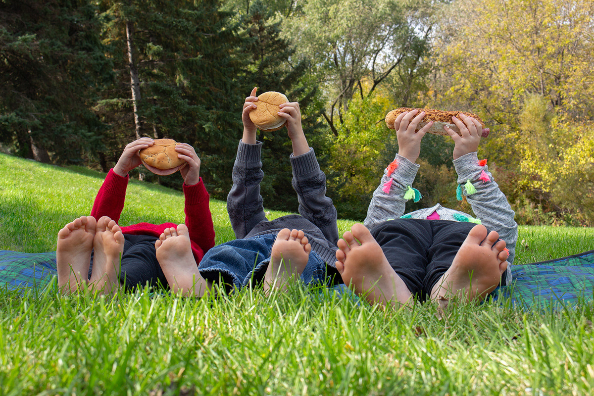 Commercial lifestyle photography of children in a Minneapolis park for EA Sween branding by John Hermansen