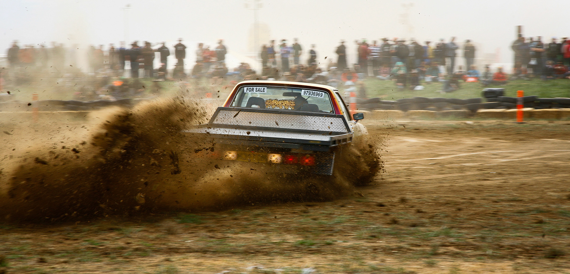 Utes doing circle work at Deniliquin Ute Muster. October 2, 2009. Deniliquin, NSW.