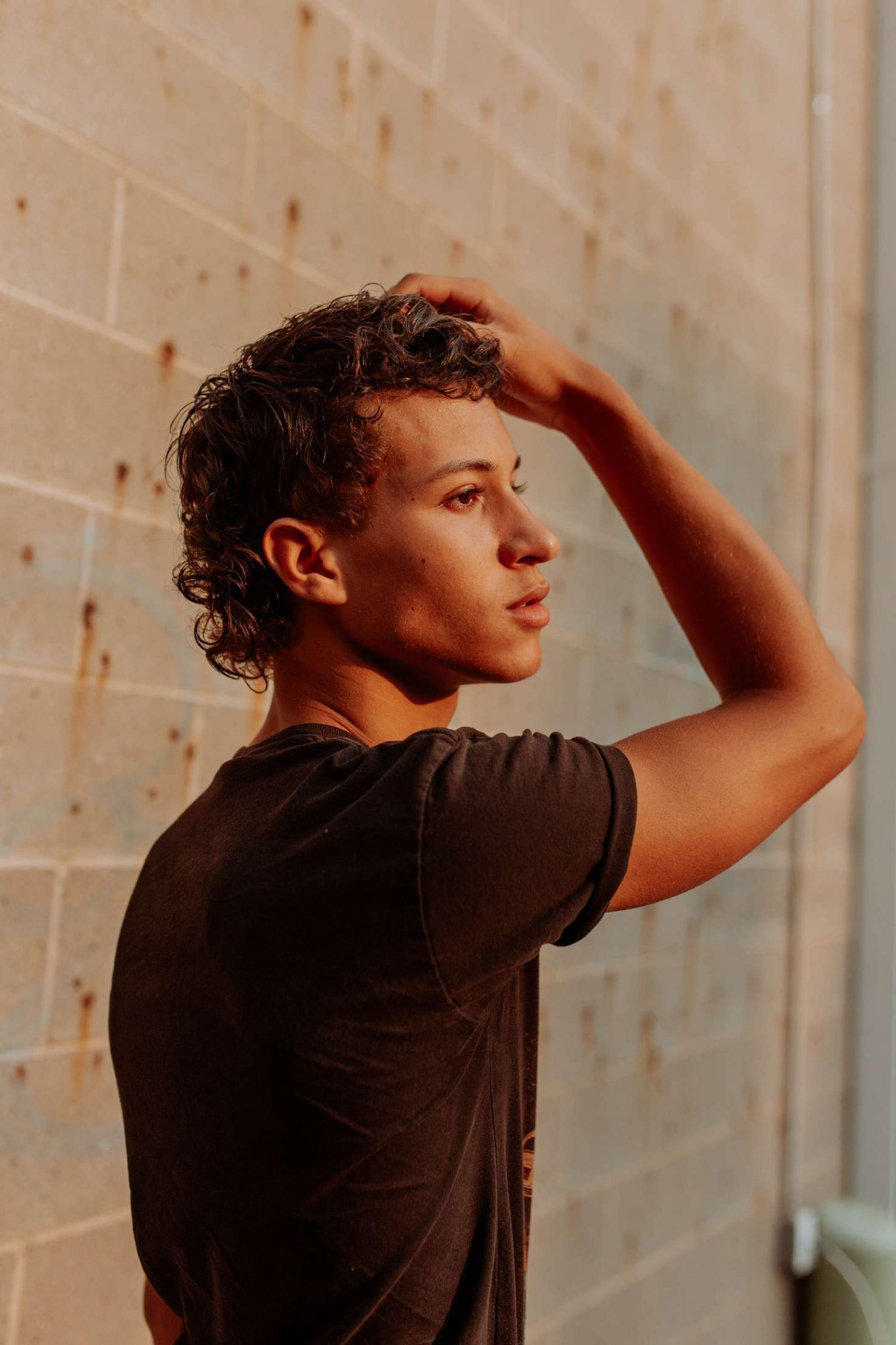 "A huge reason why I picked Jo to do my senior pictures was the fact that they are such a positive and inspiring person. Given that we are both Black, queer artists, I thought it would be important to find unity in my community through these identifications," - Paxton, 2021