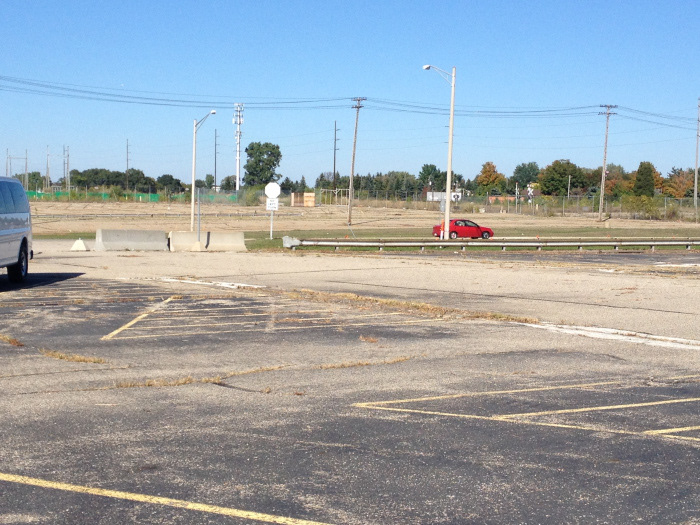 The parking lot of the former Lansing Craft Centre and Saginaw Highway