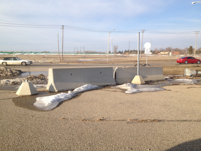 Road barriers block of some of the entrances to the Lansing Craft Centre site.