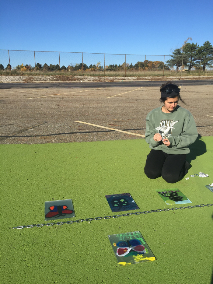 Liz and I laying panels on the ground in preparation for attachment