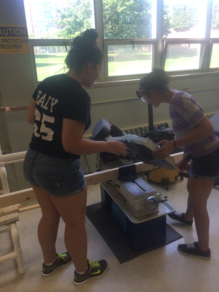 The design team builds a prototype road barrier.