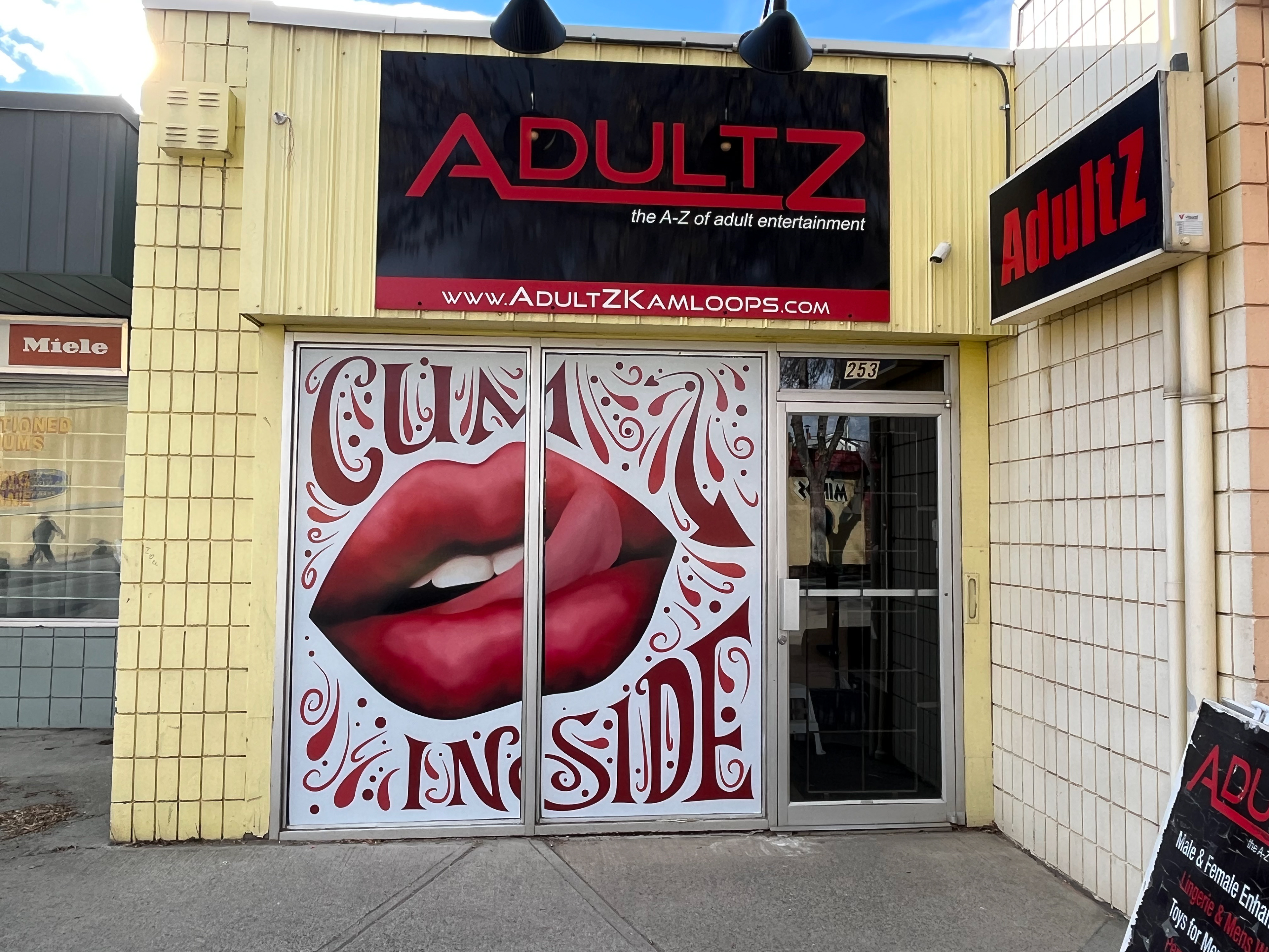 Window decal for adult store