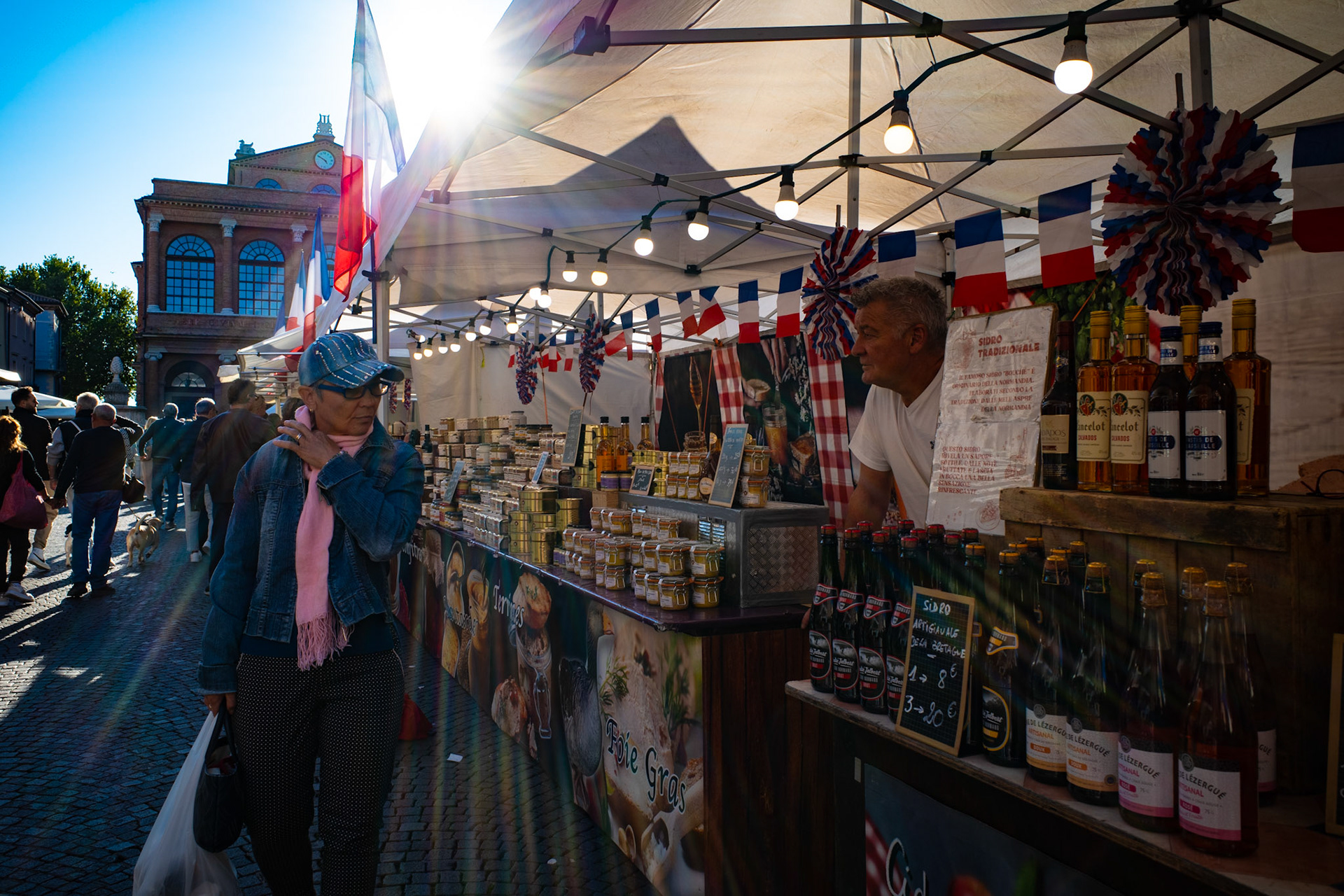 In the market of sunlight where colors blend with the scent of the day