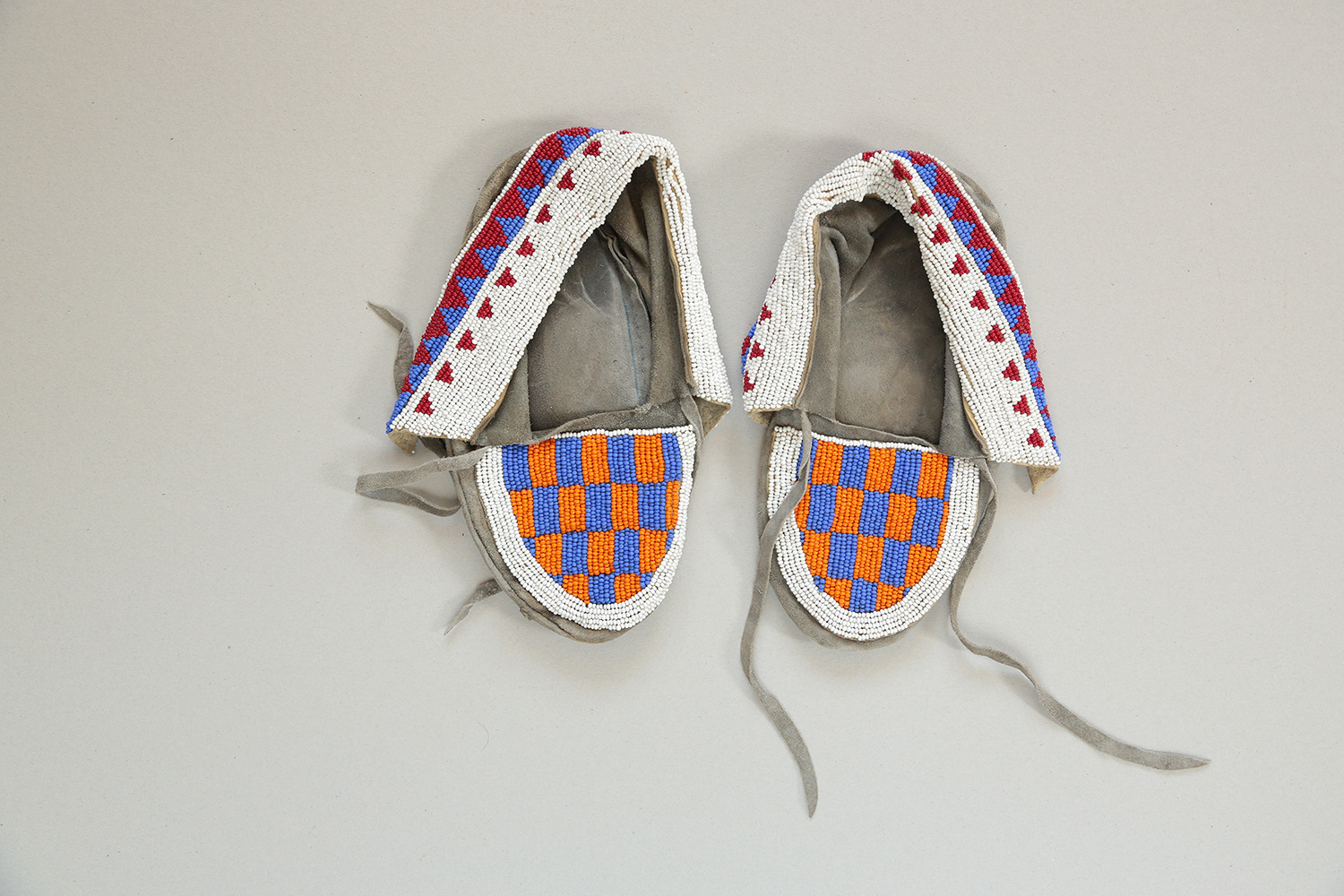 Fig 7: moccasins (leather, beads)