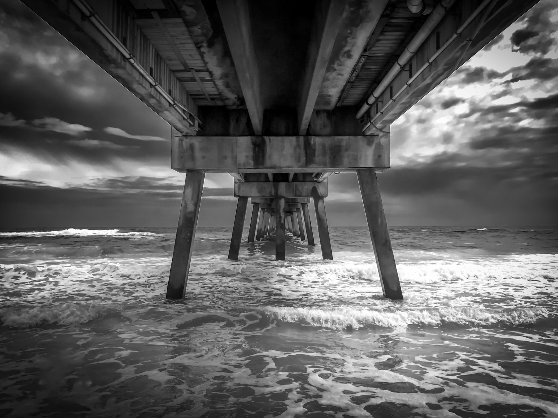 Under the Pier - Black and White Dramatic Waves