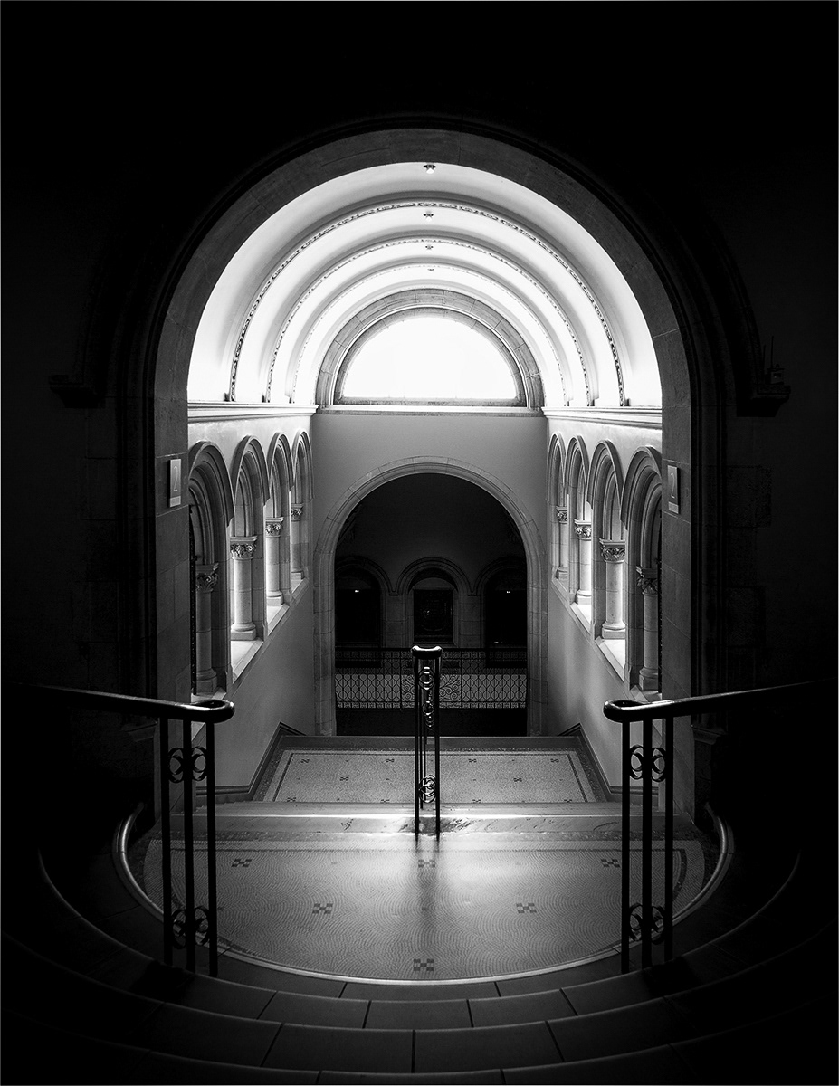 "THE ARCHES OF A MUSEUM STAIRCASE"